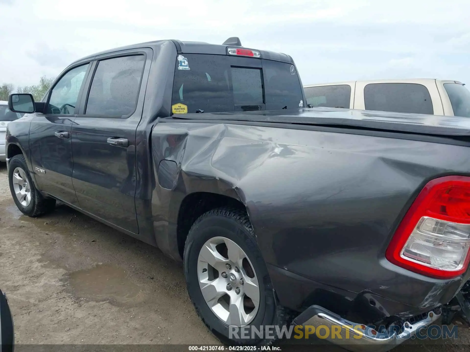 14 Photograph of a damaged car 1C6SRFFT1KN645322 RAM 1500 2019