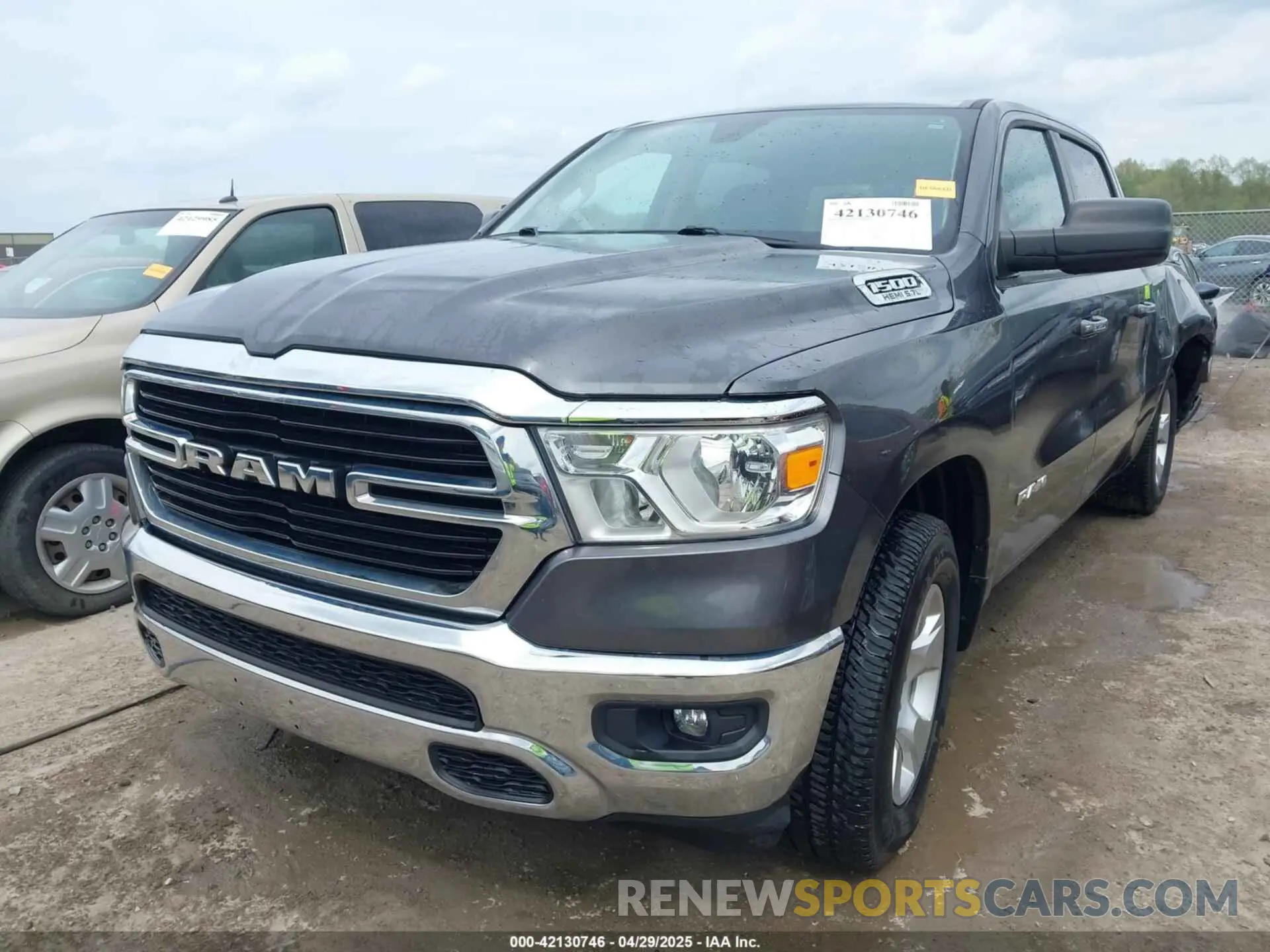 2 Photograph of a damaged car 1C6SRFFT1KN645322 RAM 1500 2019
