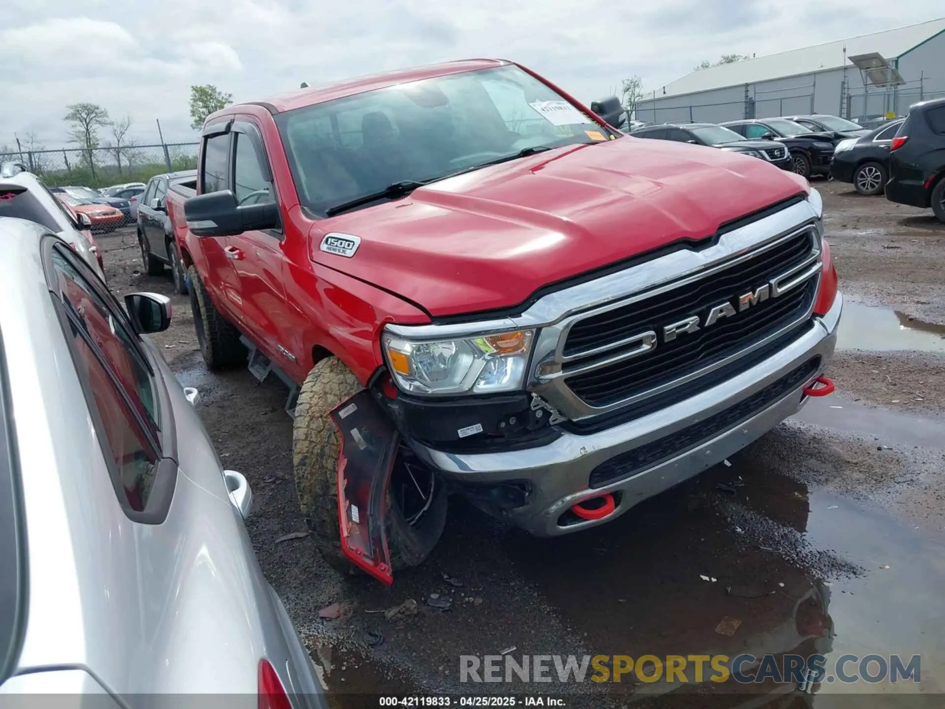 1 Photograph of a damaged car 1C6SRFFT1KN650004 RAM 1500 2019