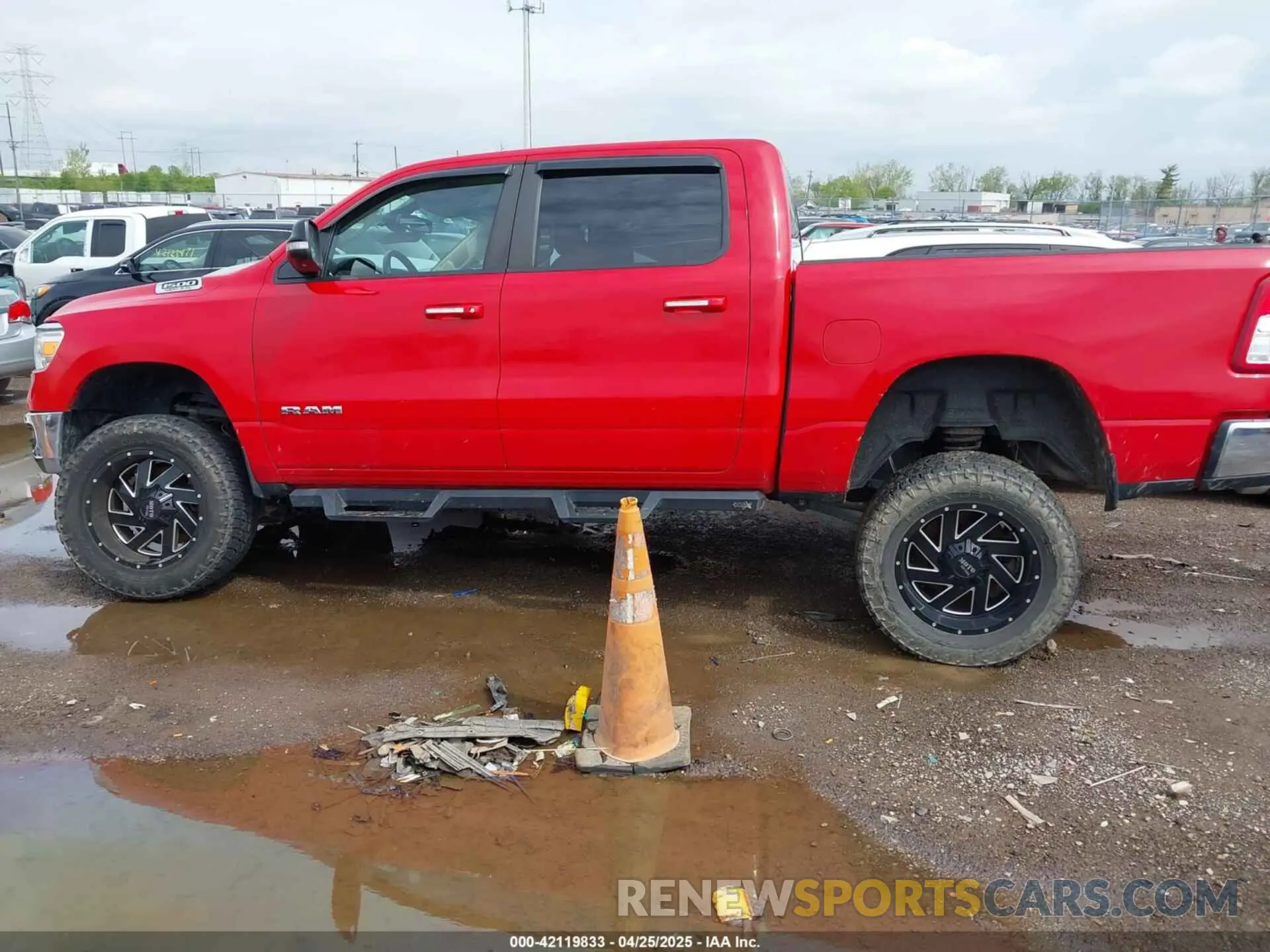 14 Photograph of a damaged car 1C6SRFFT1KN650004 RAM 1500 2019
