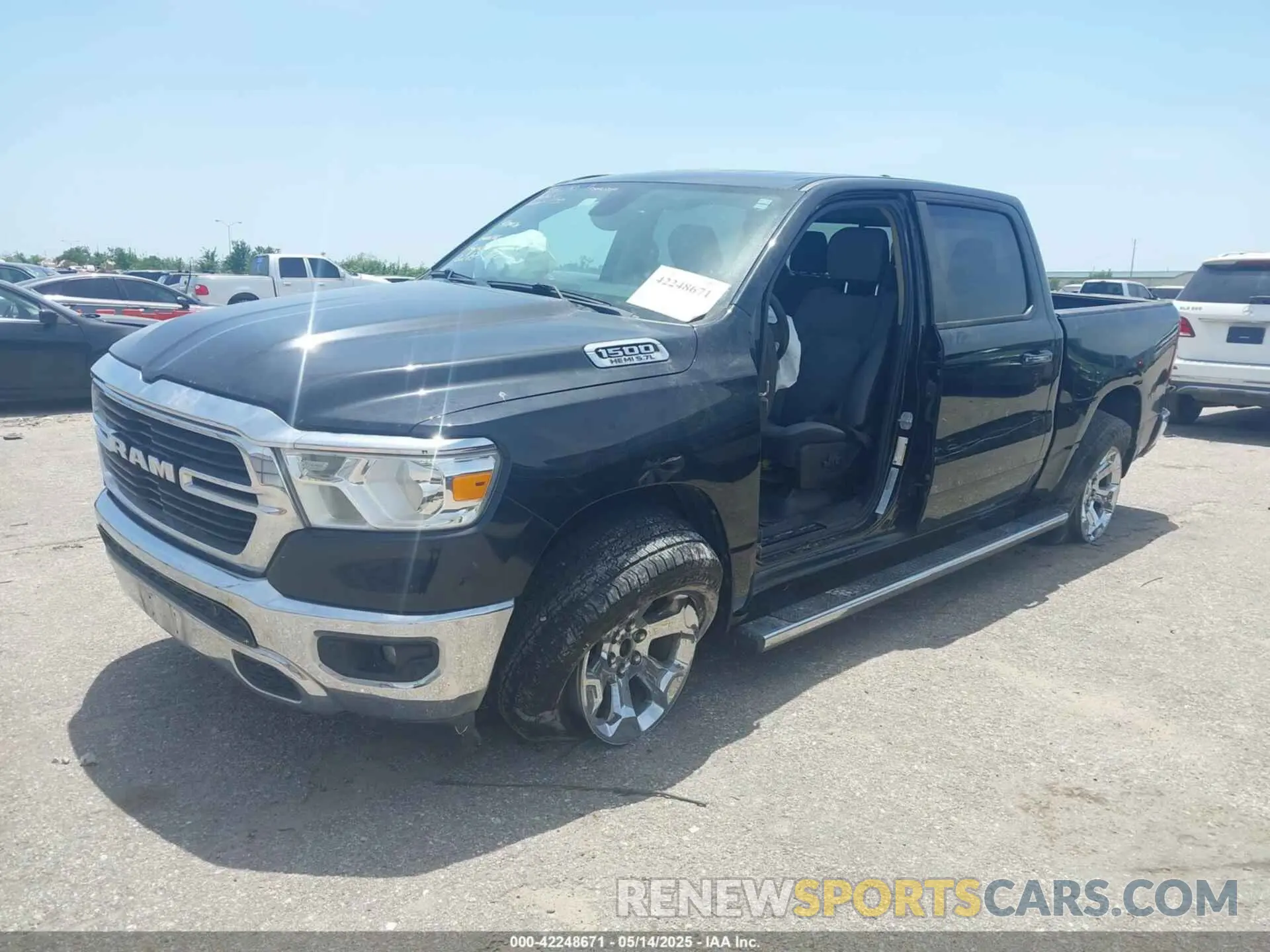 2 Photograph of a damaged car 1C6SRFFT1KN663285 RAM 1500 2019