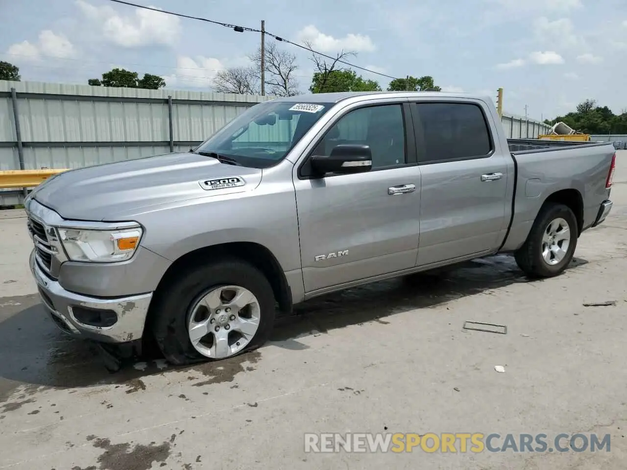 1 Photograph of a damaged car 1C6SRFFT1KN686081 RAM 1500 2019