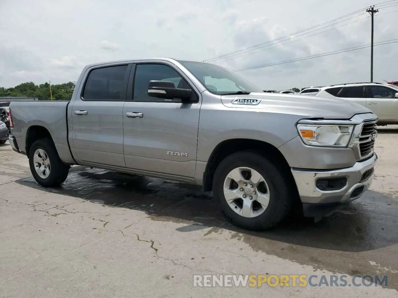 4 Photograph of a damaged car 1C6SRFFT1KN686081 RAM 1500 2019