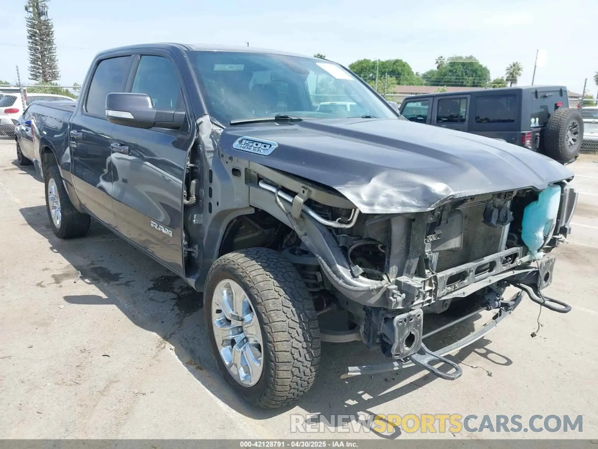 1 Photograph of a damaged car 1C6SRFFT1KN732525 RAM 1500 2019