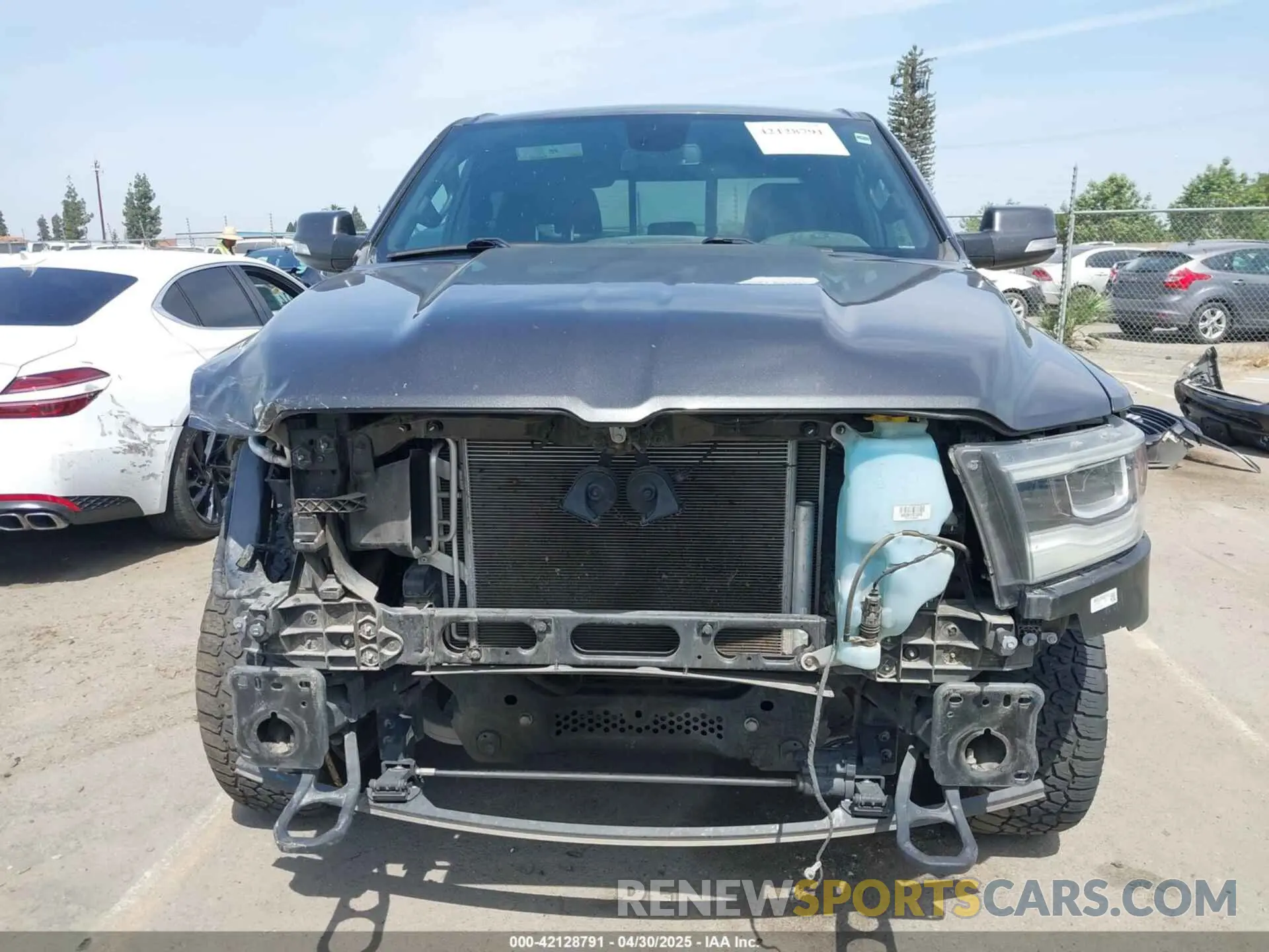 13 Photograph of a damaged car 1C6SRFFT1KN732525 RAM 1500 2019