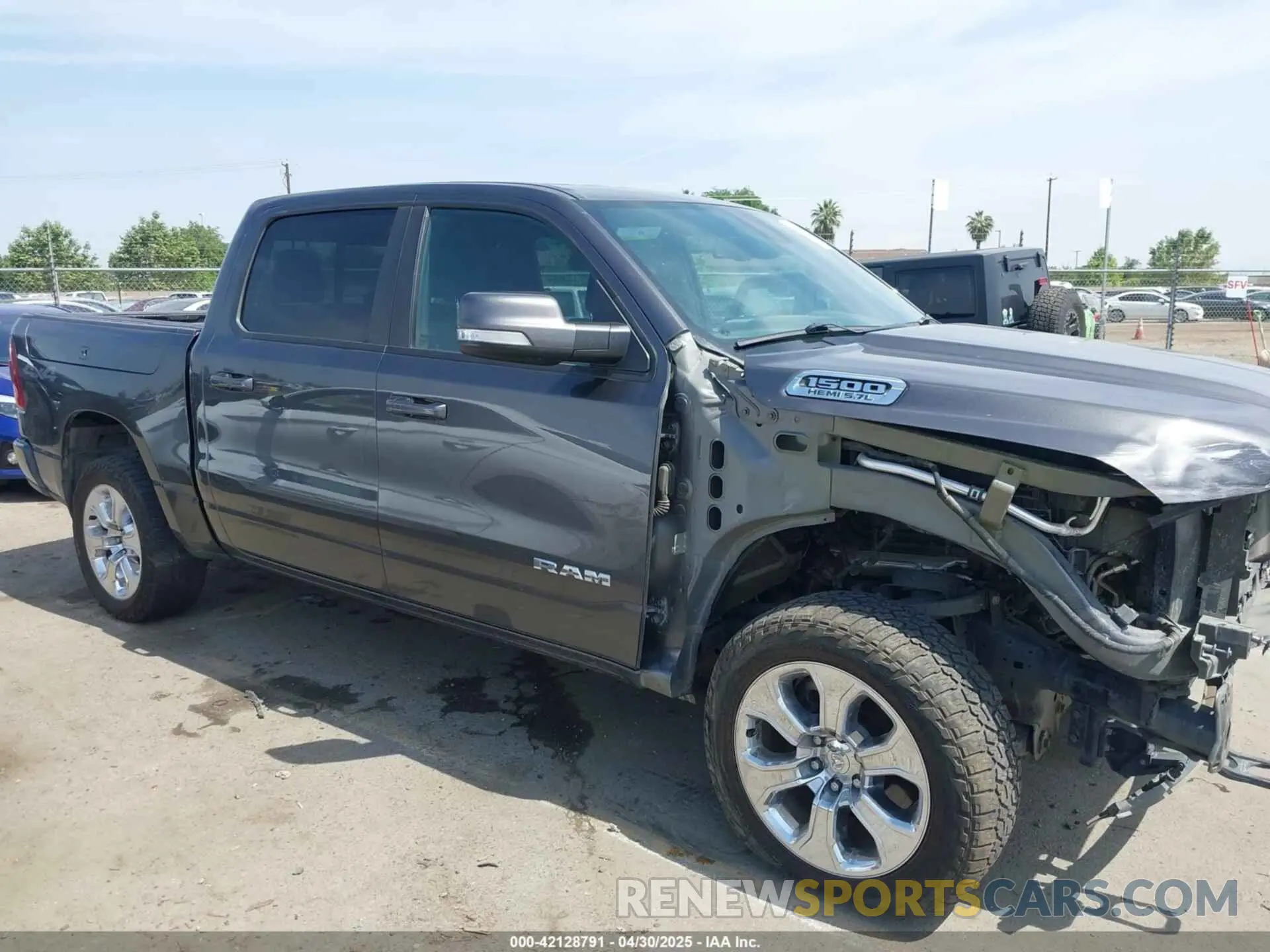 14 Photograph of a damaged car 1C6SRFFT1KN732525 RAM 1500 2019