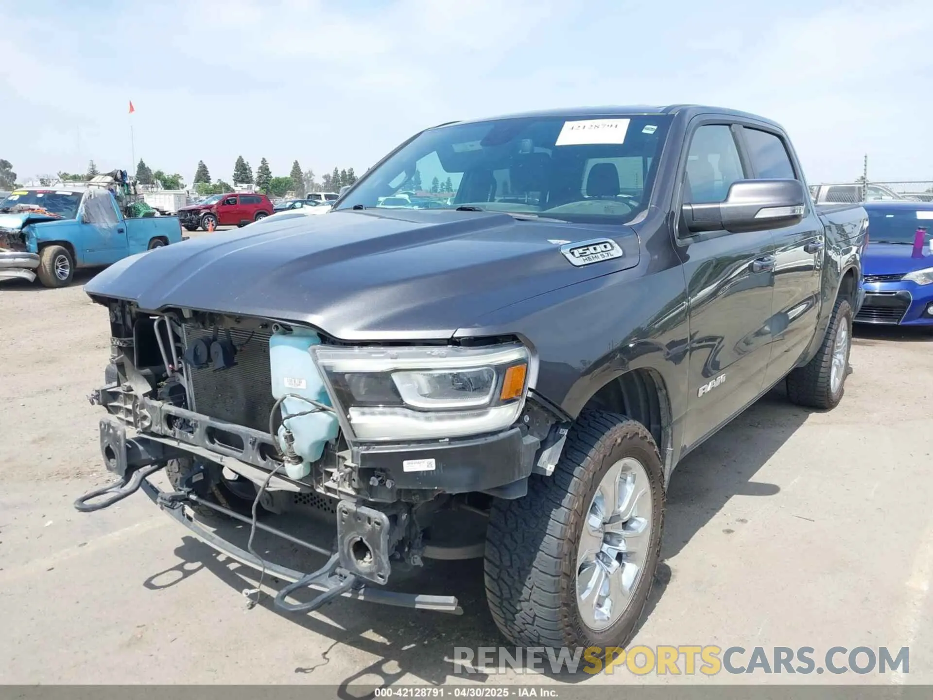 2 Photograph of a damaged car 1C6SRFFT1KN732525 RAM 1500 2019