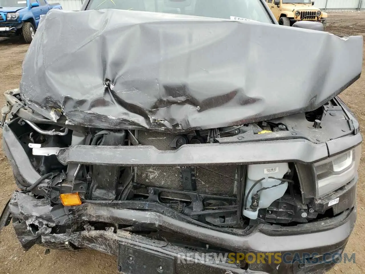 12 Photograph of a damaged car 1C6SRFFT1KN755707 RAM 1500 2019