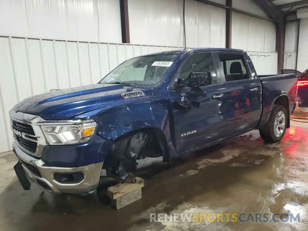 1 Photograph of a damaged car 1C6SRFFT1KN803206 RAM 1500 2019