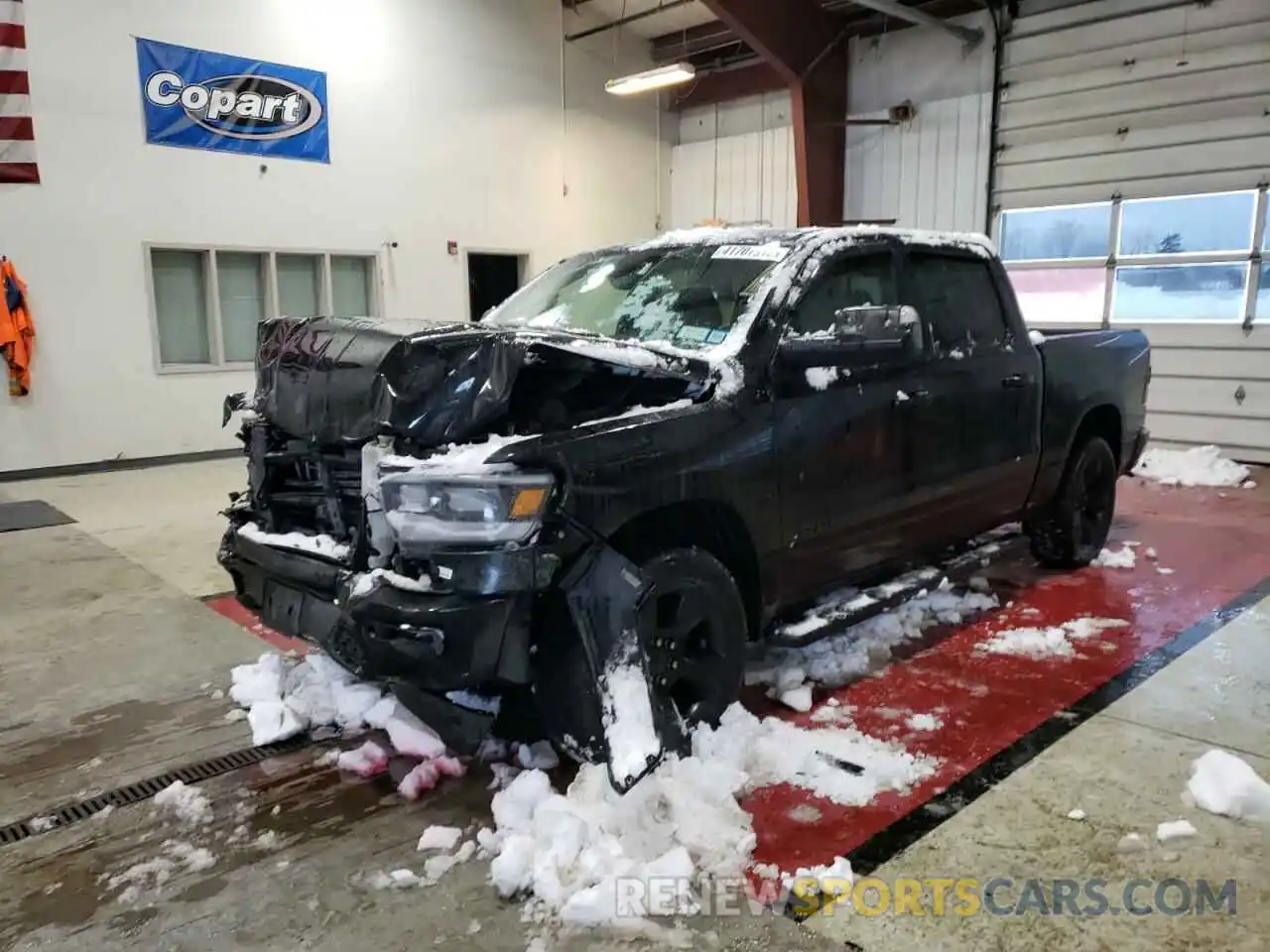 1 Photograph of a damaged car 1C6SRFFT1KN804307 RAM 1500 2019