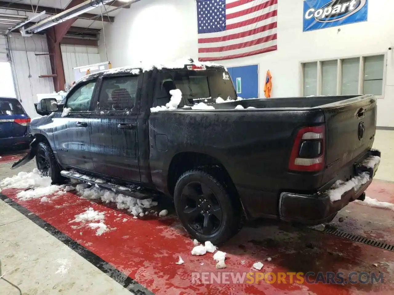 2 Photograph of a damaged car 1C6SRFFT1KN804307 RAM 1500 2019