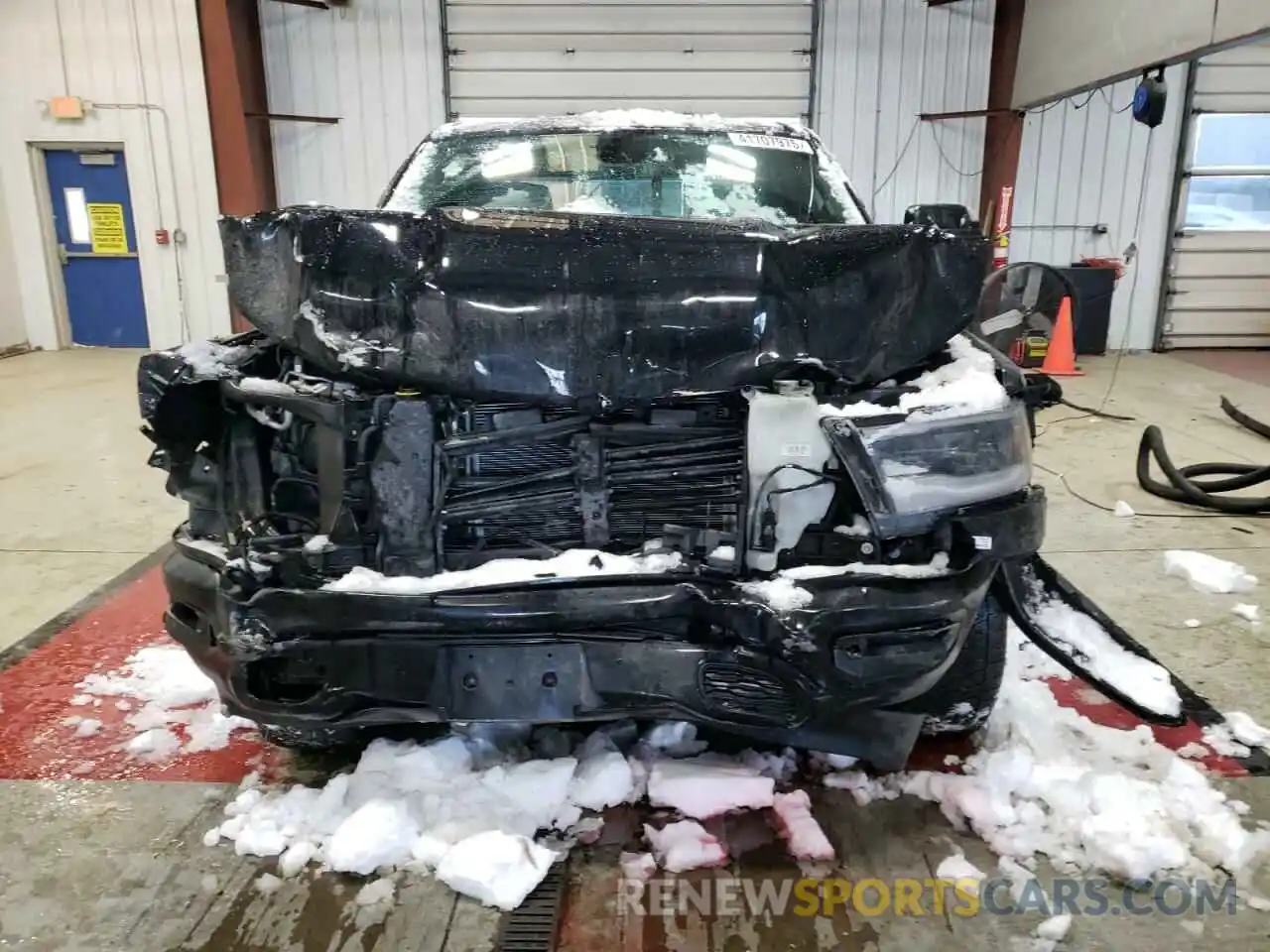 5 Photograph of a damaged car 1C6SRFFT1KN804307 RAM 1500 2019