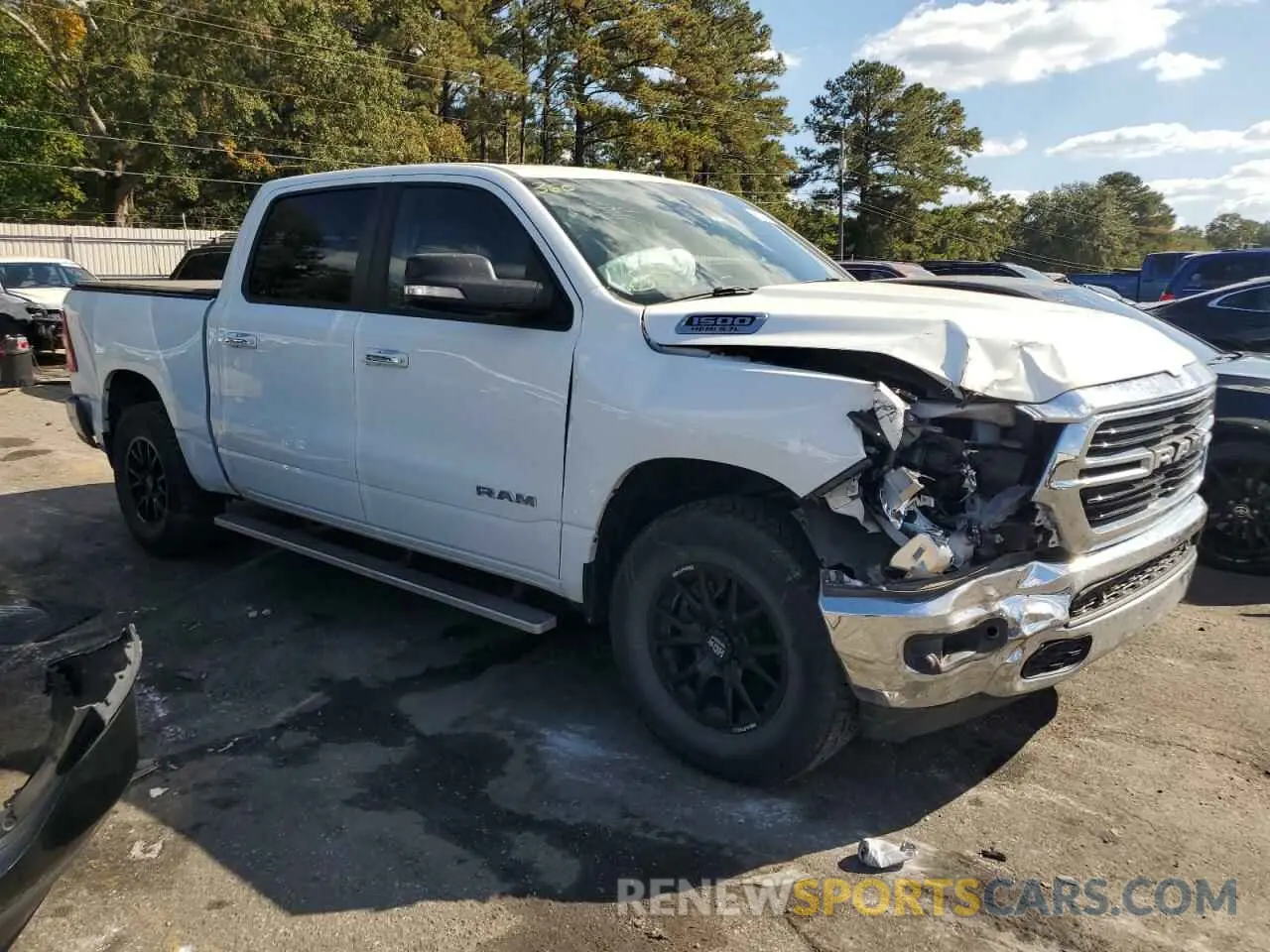 4 Photograph of a damaged car 1C6SRFFT1KN856276 RAM 1500 2019