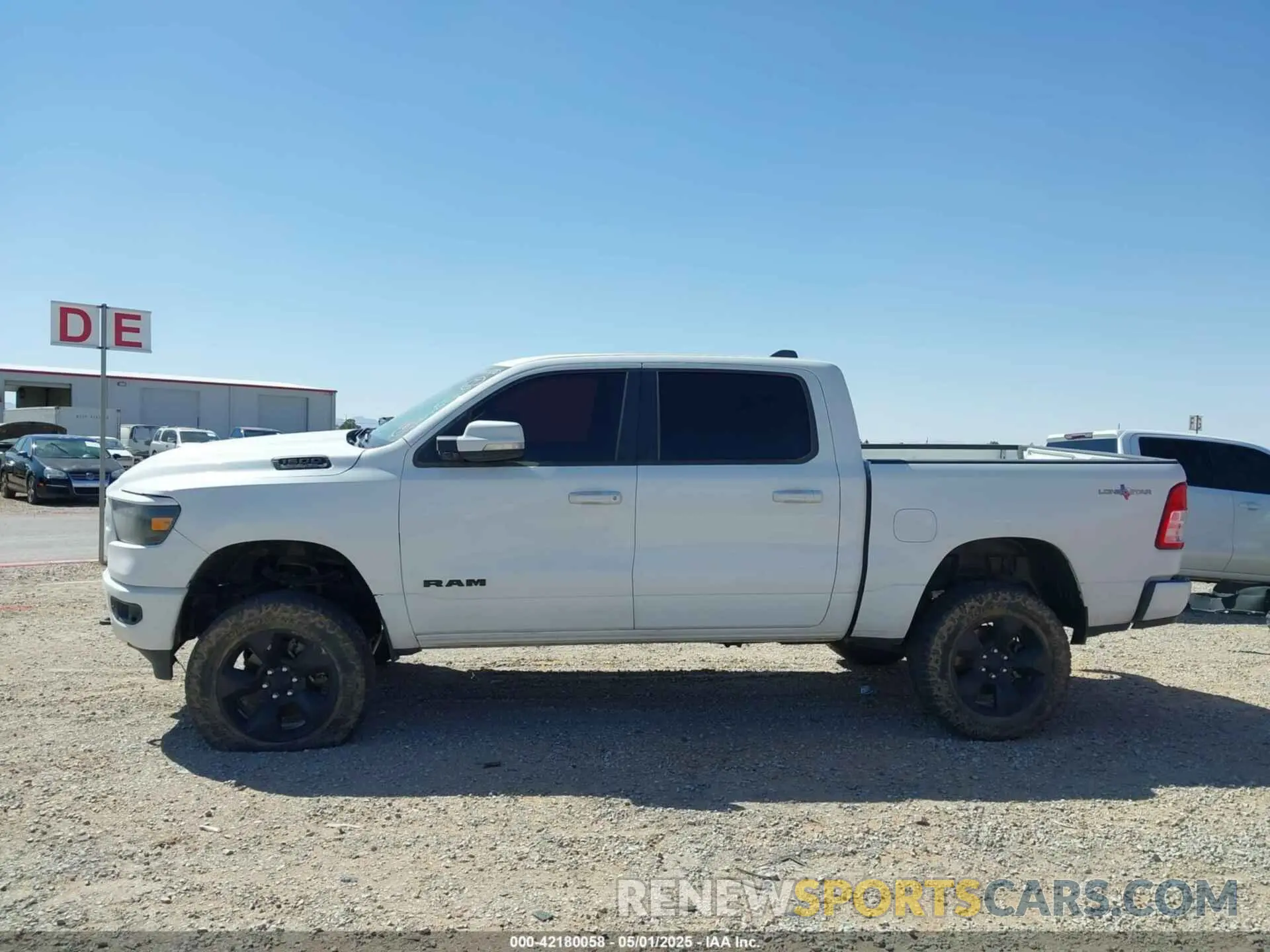 14 Photograph of a damaged car 1C6SRFFT1KN878567 RAM 1500 2019