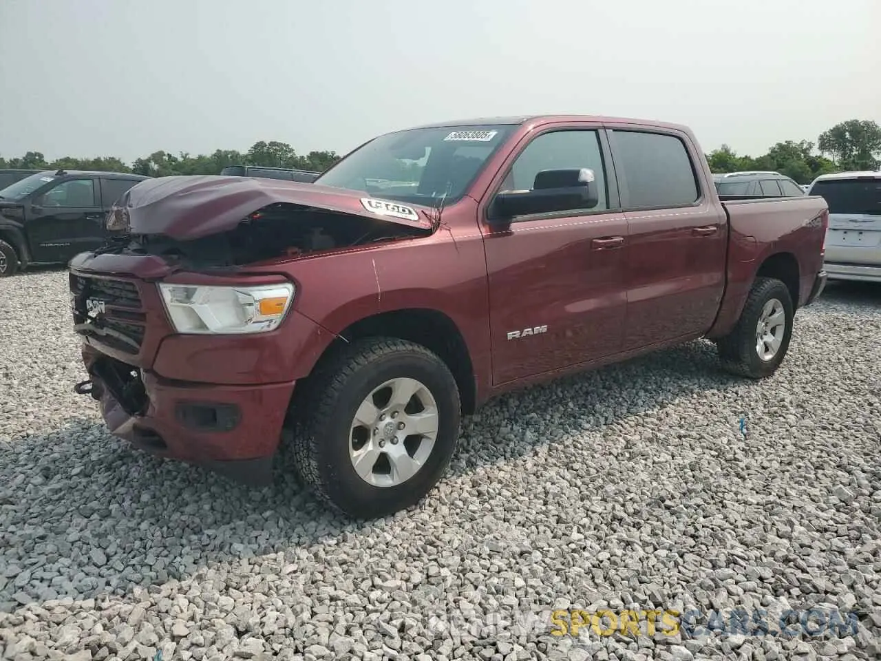 1 Photograph of a damaged car 1C6SRFFT2KN677017 RAM 1500 2019