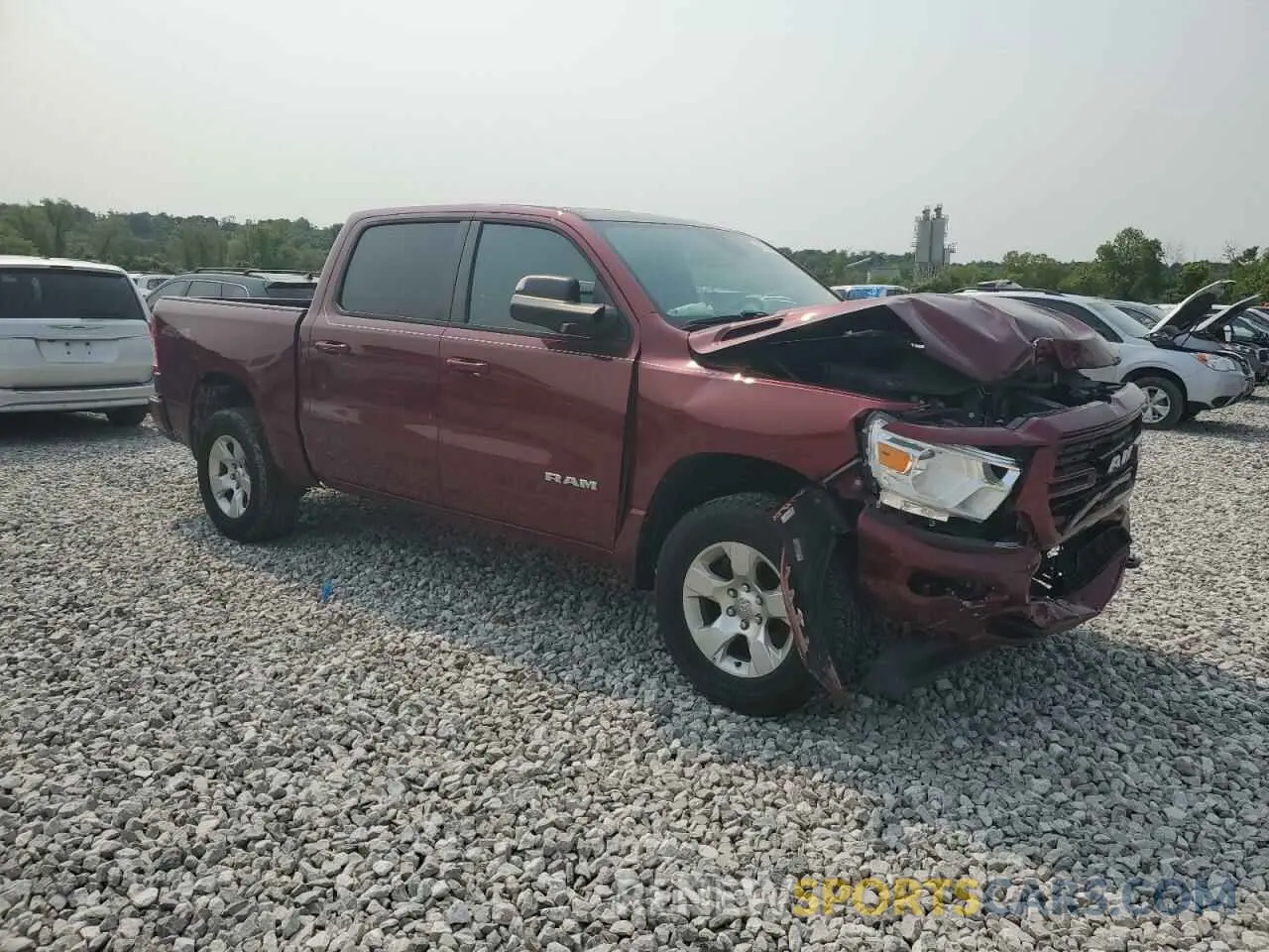 4 Photograph of a damaged car 1C6SRFFT2KN677017 RAM 1500 2019