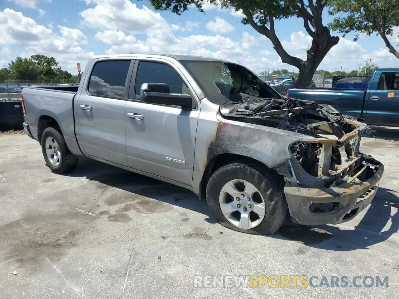 4 Photograph of a damaged car 1C6SRFFT2KN742416 RAM 1500 2019