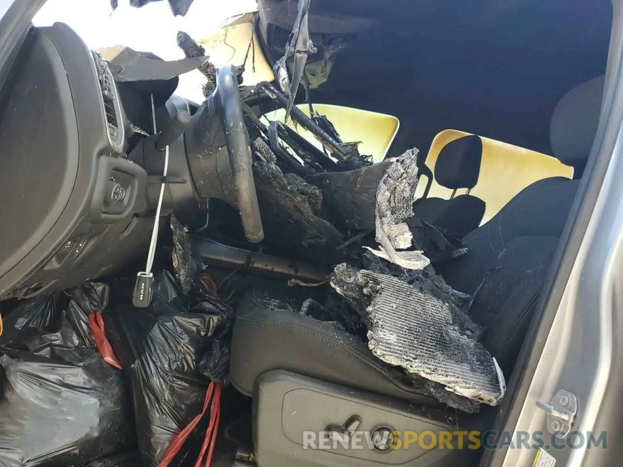 7 Photograph of a damaged car 1C6SRFFT2KN742416 RAM 1500 2019