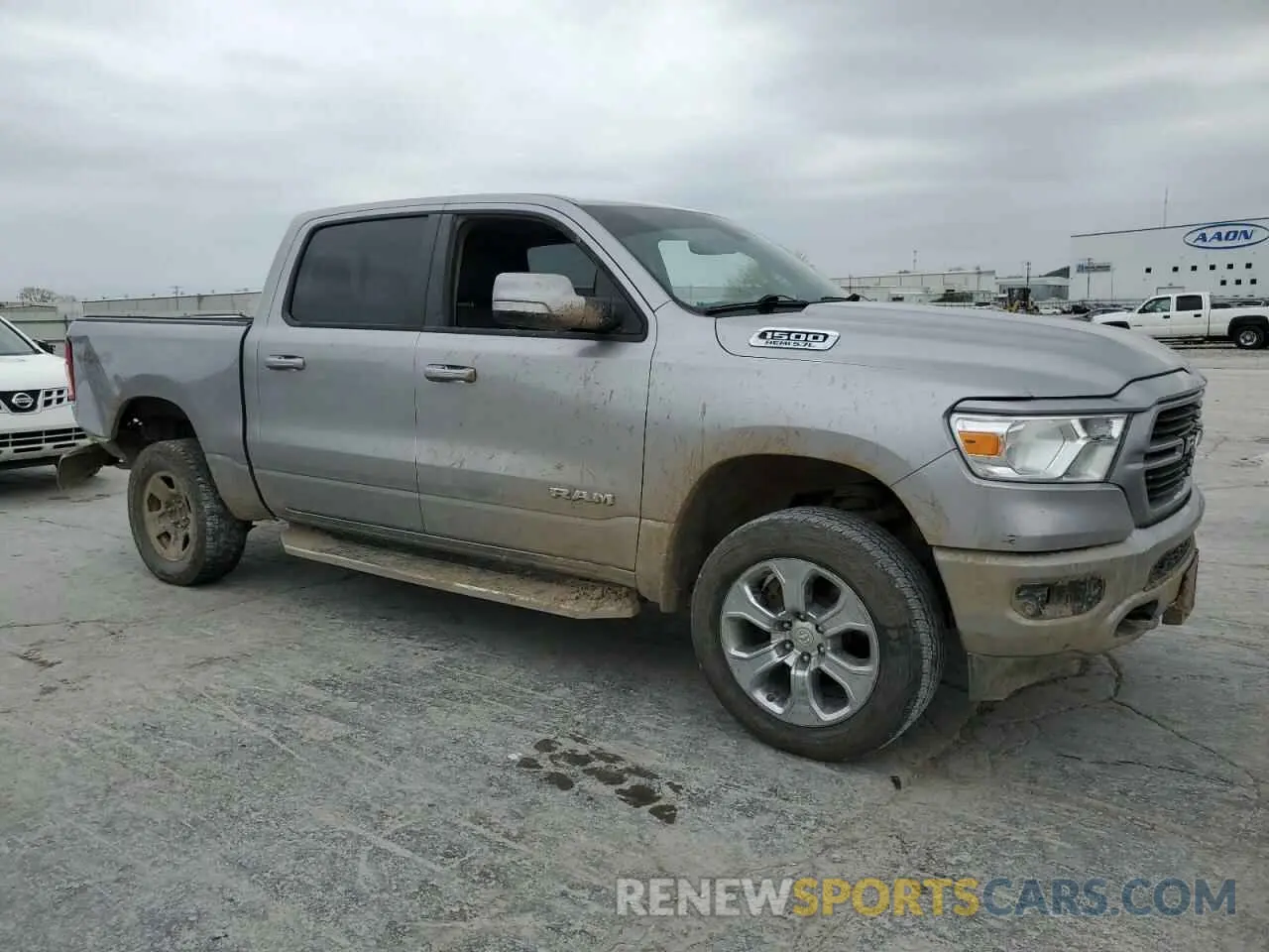 4 Photograph of a damaged car 1C6SRFFT2KN812531 RAM 1500 2019