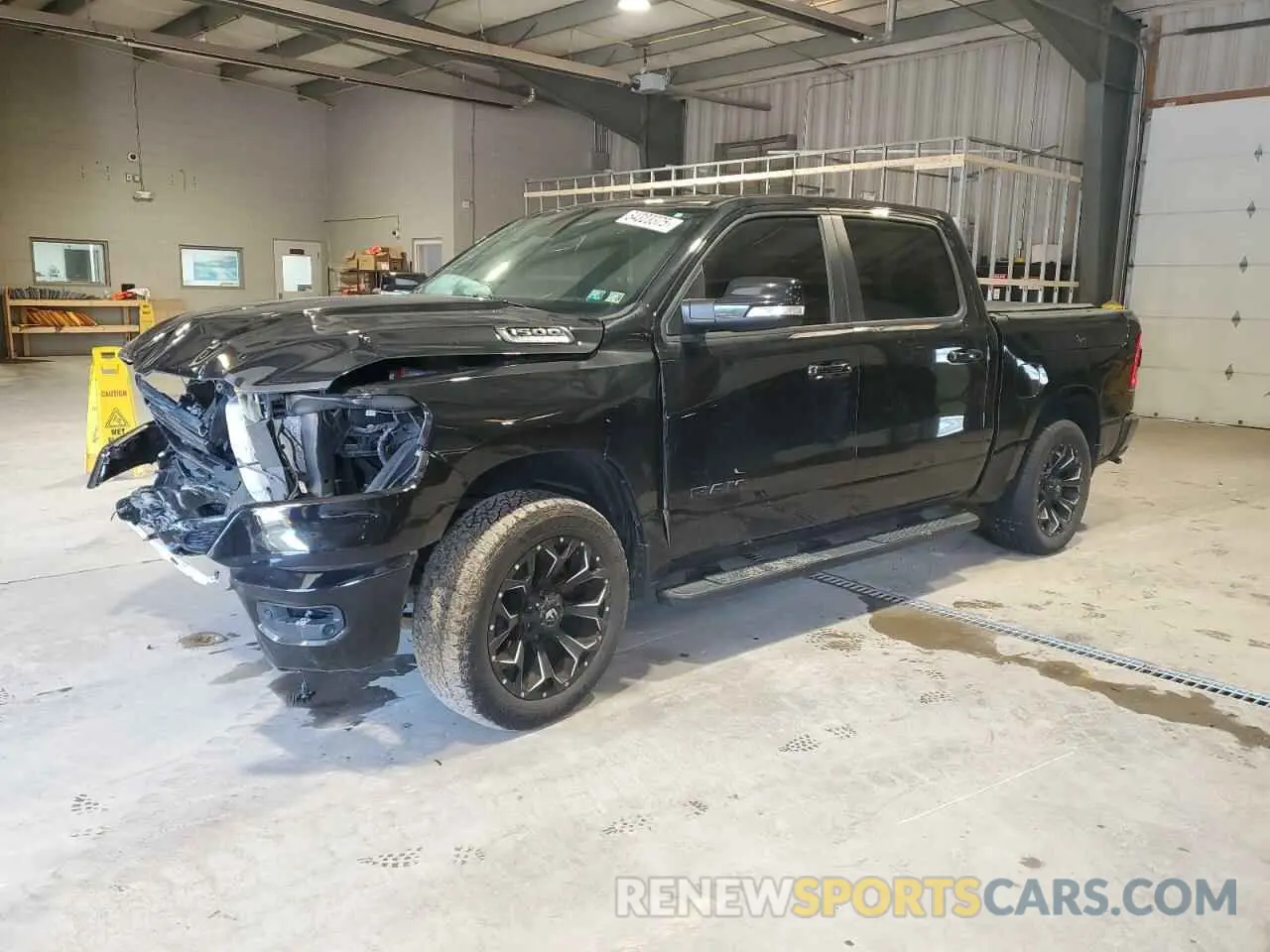 1 Photograph of a damaged car 1C6SRFFT2KN815574 RAM 1500 2019