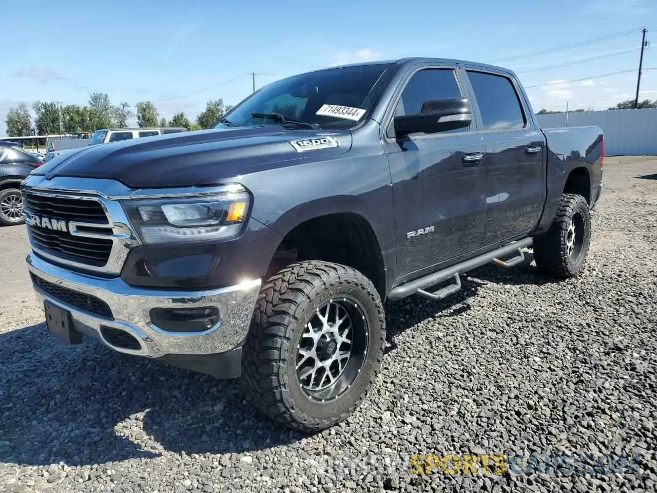 1 Photograph of a damaged car 1C6SRFFT2KN908532 RAM 1500 2019