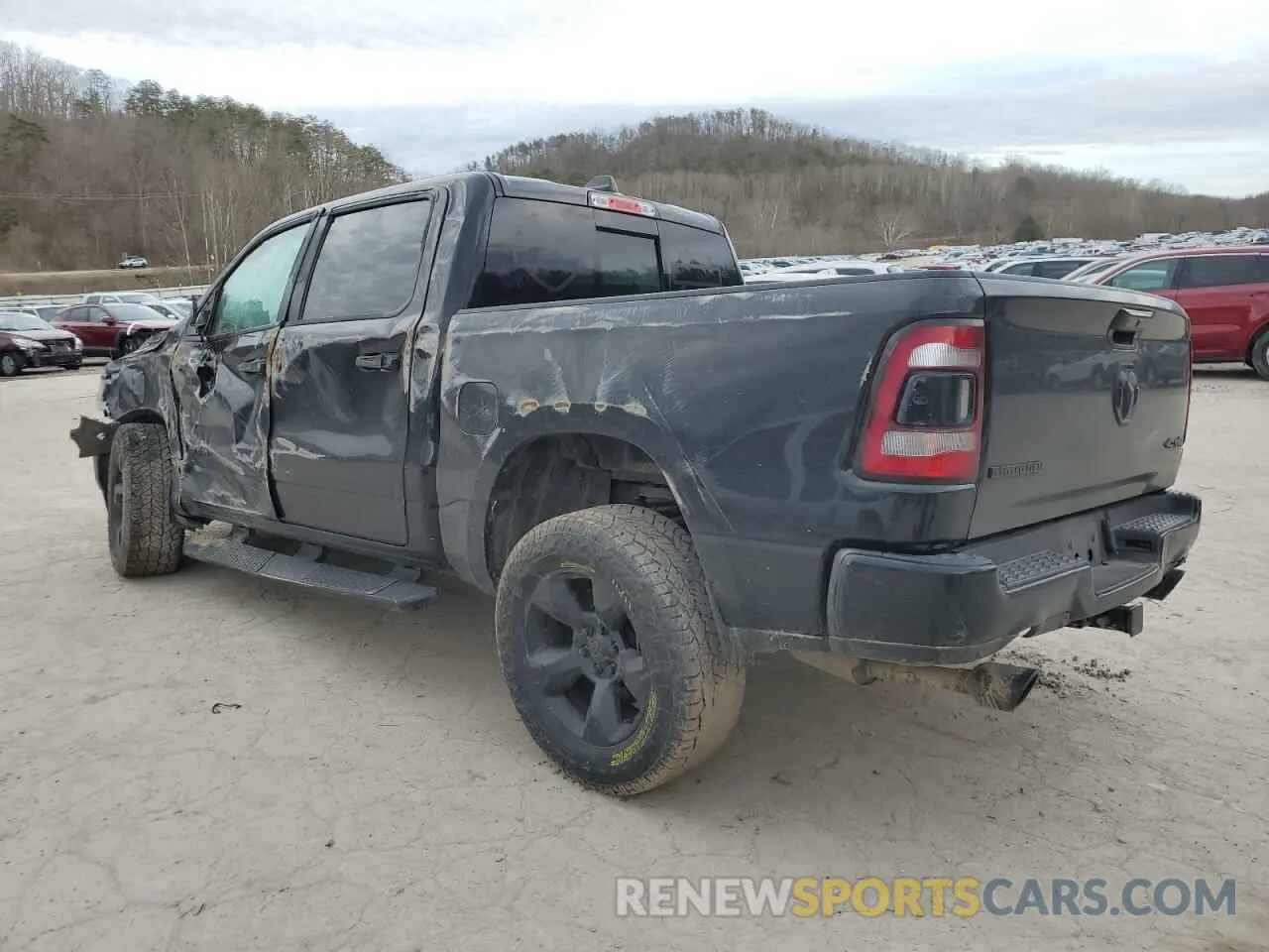 2 Photograph of a damaged car 1C6SRFFT3KN523397 RAM 1500 2019