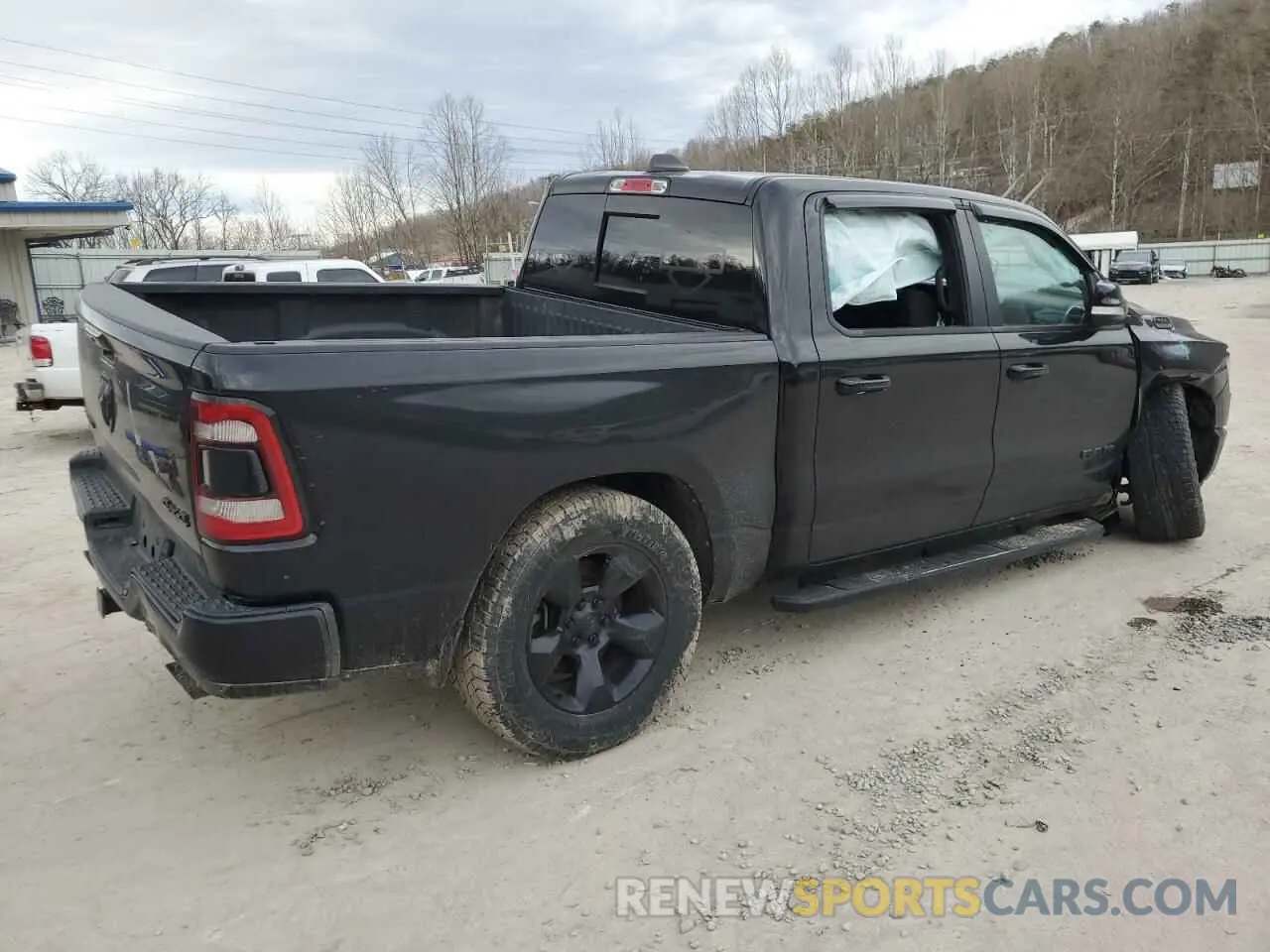 3 Photograph of a damaged car 1C6SRFFT3KN523397 RAM 1500 2019