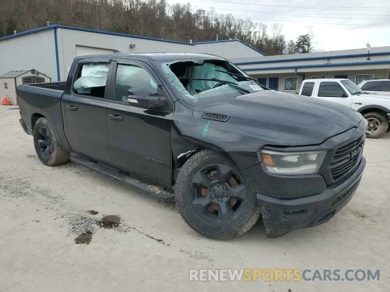 4 Photograph of a damaged car 1C6SRFFT3KN523397 RAM 1500 2019