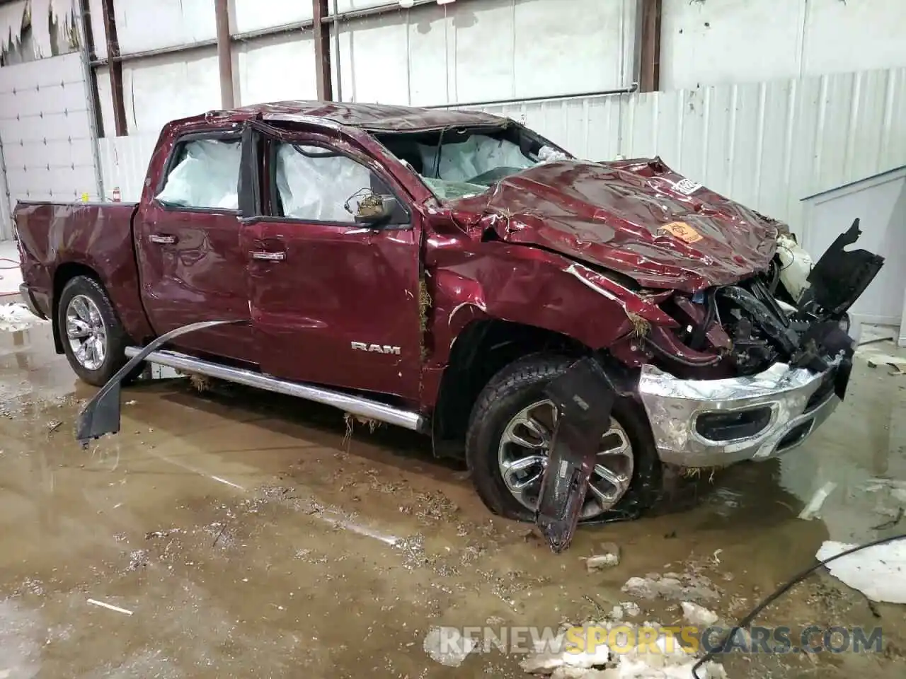 4 Photograph of a damaged car 1C6SRFFT3KN536442 RAM 1500 2019