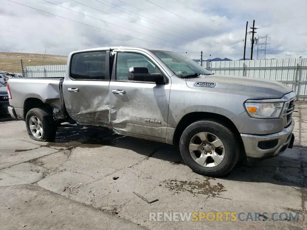 4 Photograph of a damaged car 1C6SRFFT3KN540734 RAM 1500 2019