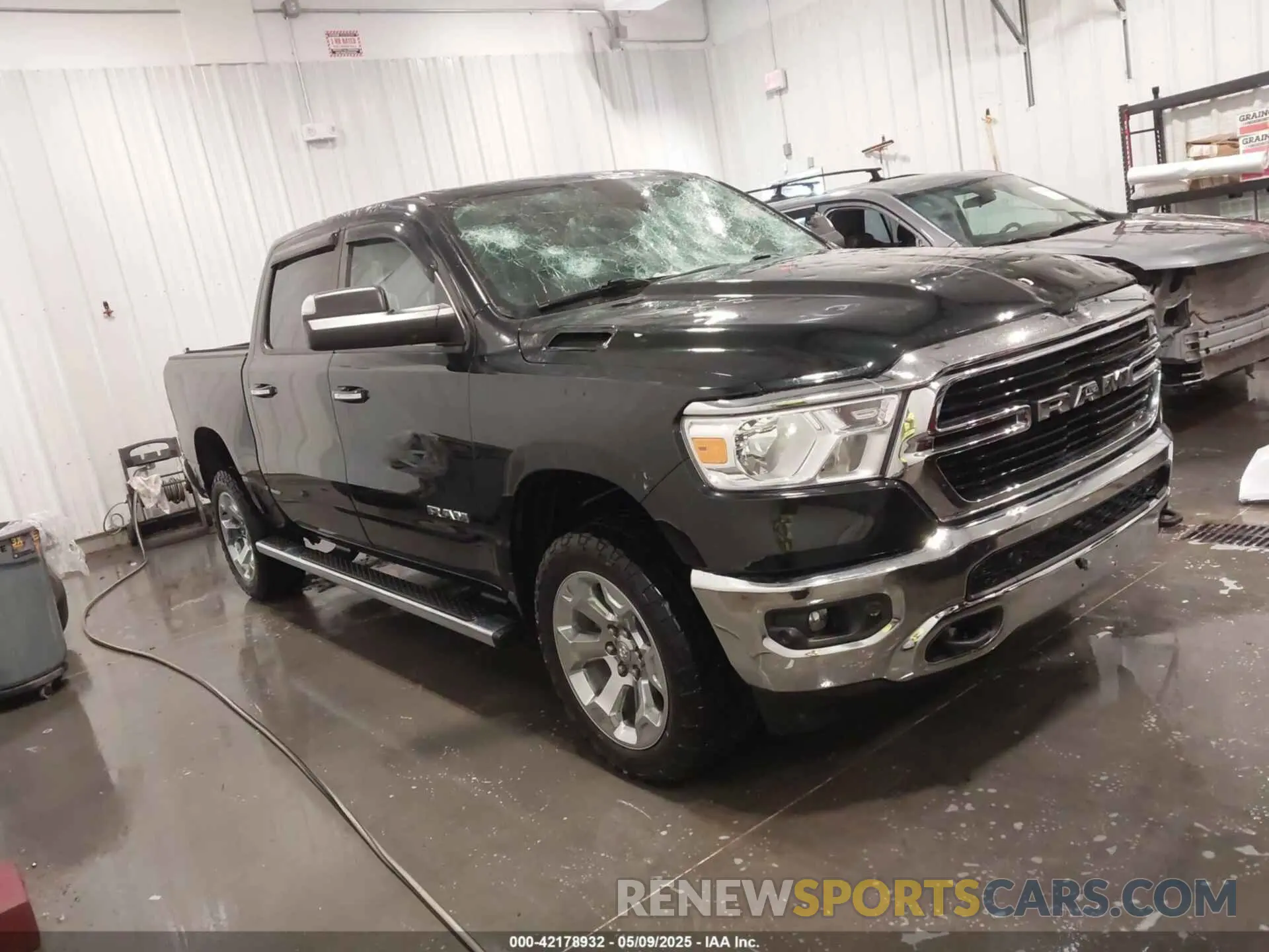 1 Photograph of a damaged car 1C6SRFFT3KN625461 RAM 1500 2019