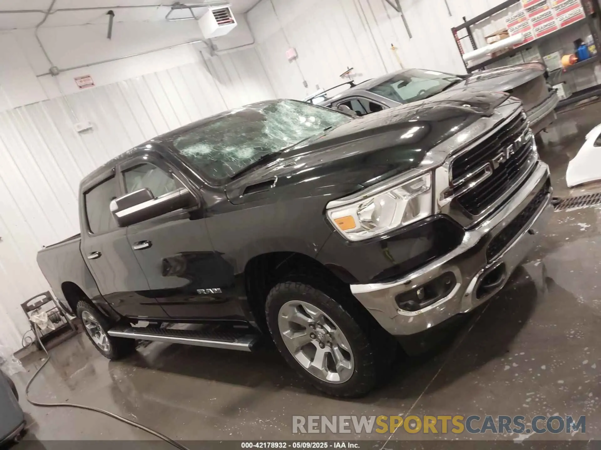 14 Photograph of a damaged car 1C6SRFFT3KN625461 RAM 1500 2019