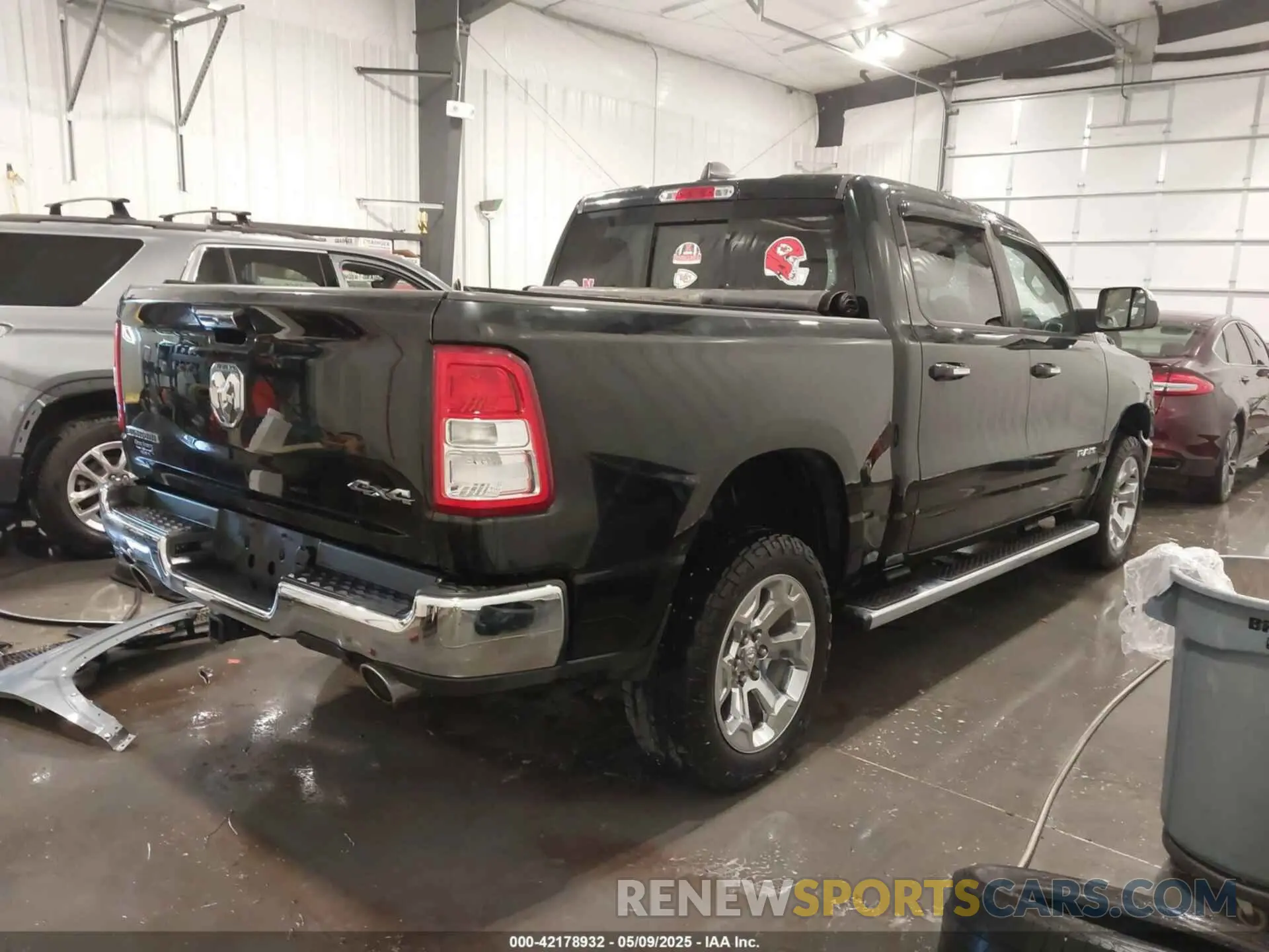 4 Photograph of a damaged car 1C6SRFFT3KN625461 RAM 1500 2019