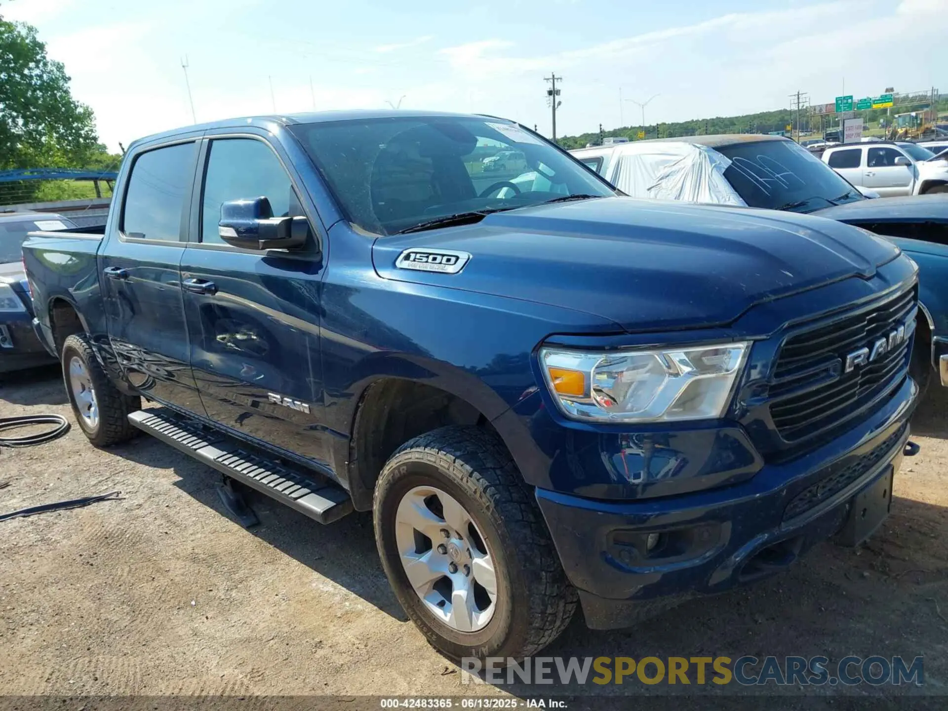 1 Photograph of a damaged car 1C6SRFFT3KN637805 RAM 1500 2019