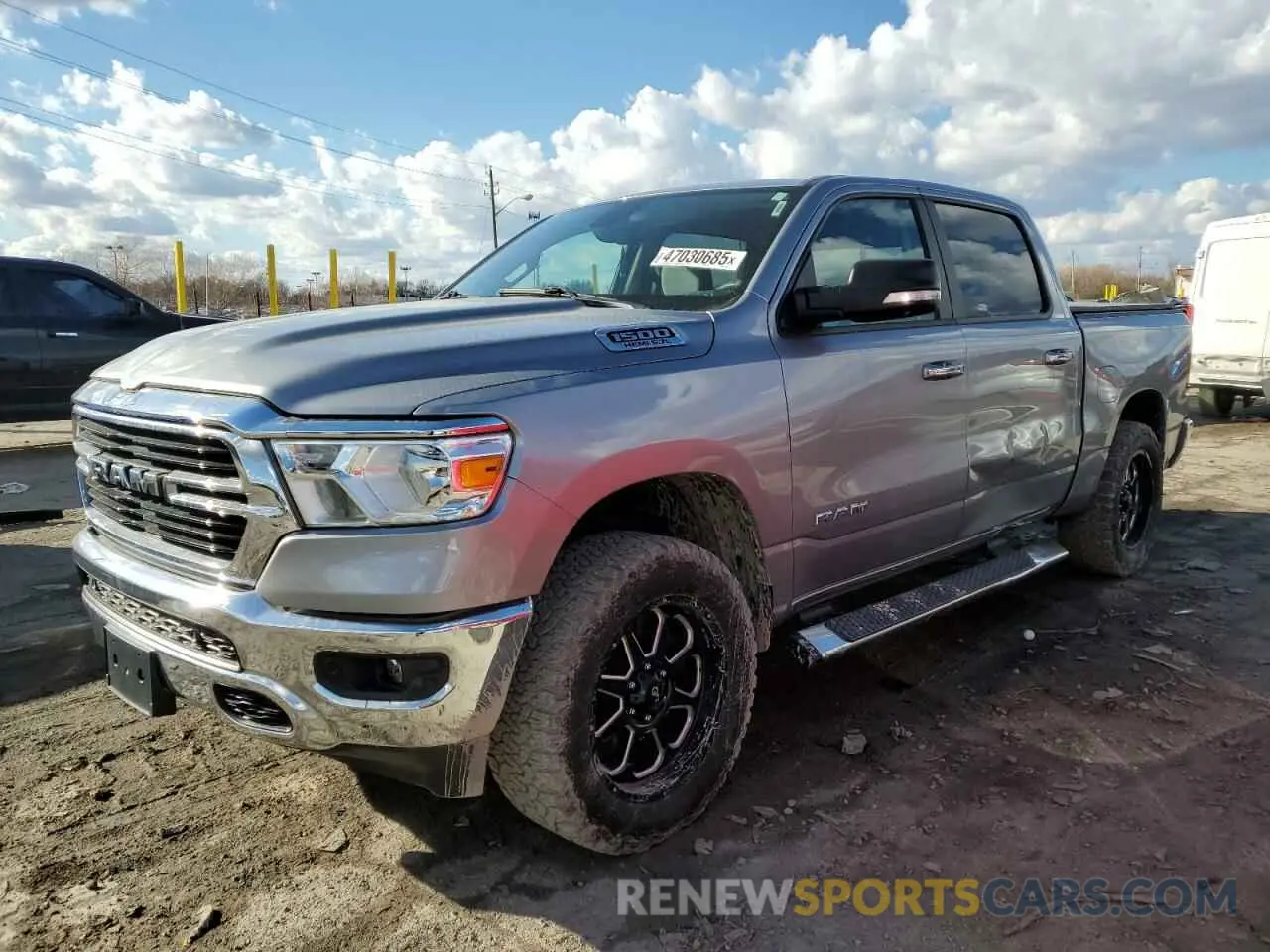 1 Photograph of a damaged car 1C6SRFFT3KN649954 RAM 1500 2019
