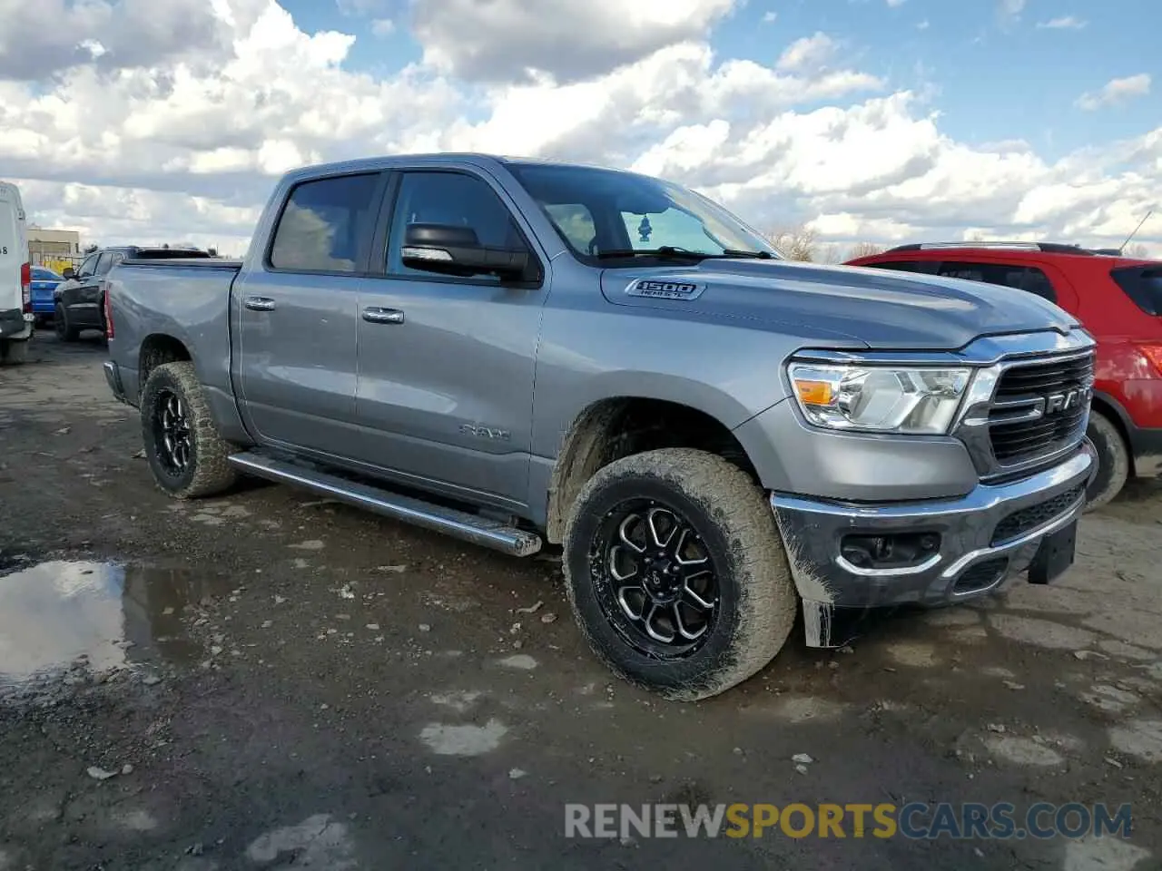 4 Photograph of a damaged car 1C6SRFFT3KN649954 RAM 1500 2019