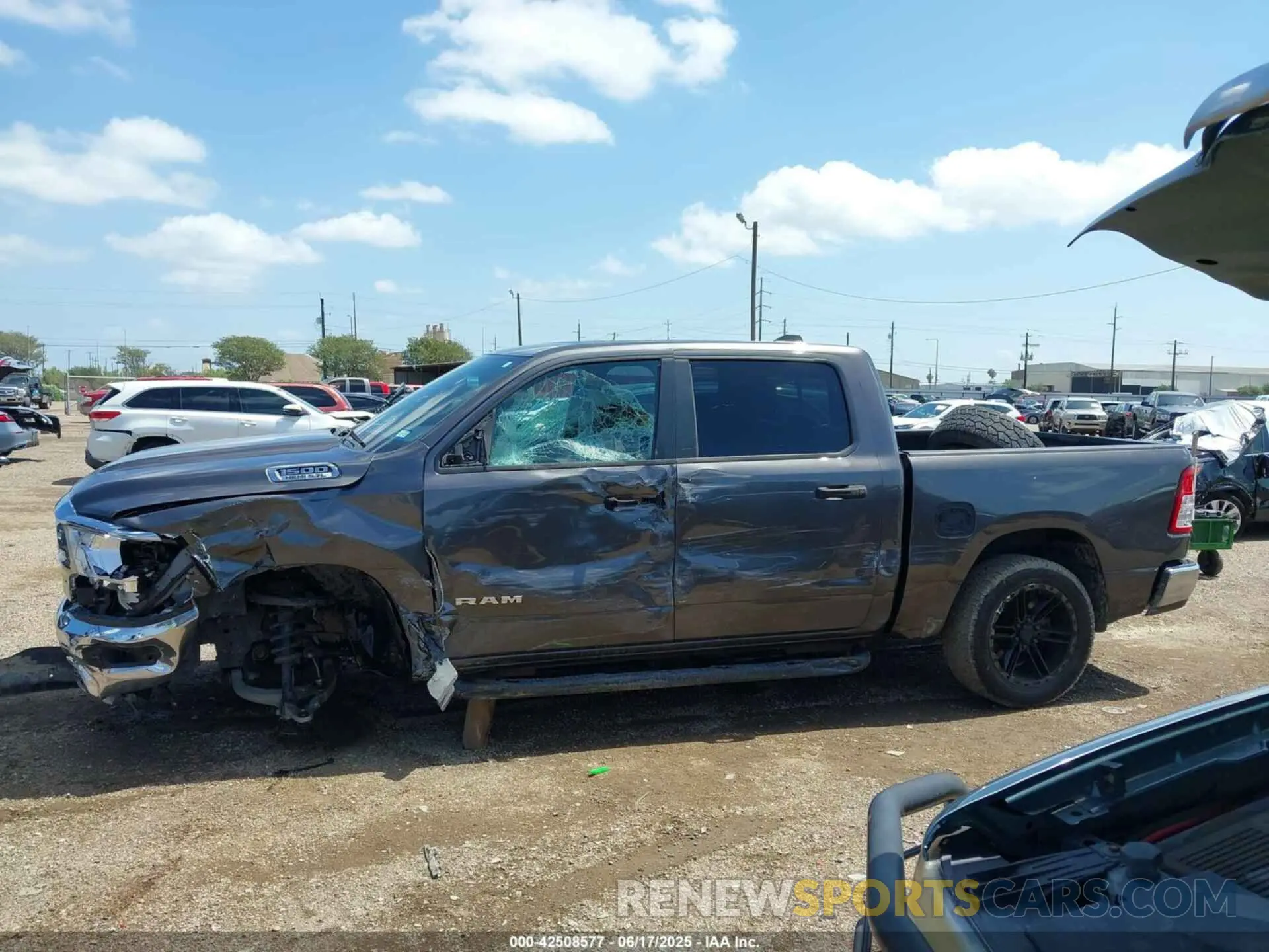 13 Photograph of a damaged car 1C6SRFFT3KN667970 RAM 1500 2019