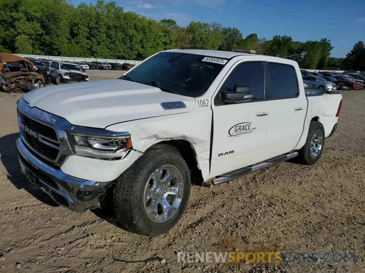 1 Photograph of a damaged car 1C6SRFFT3KN702992 RAM 1500 2019
