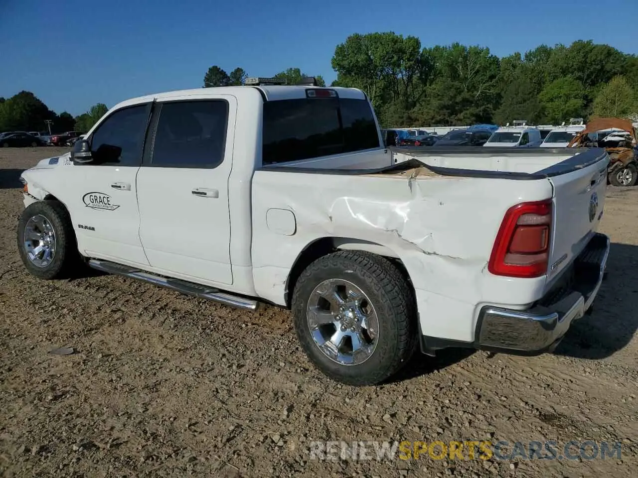 2 Photograph of a damaged car 1C6SRFFT3KN702992 RAM 1500 2019