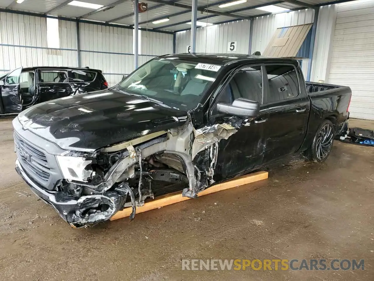 1 Photograph of a damaged car 1C6SRFFT3KN780768 RAM 1500 2019