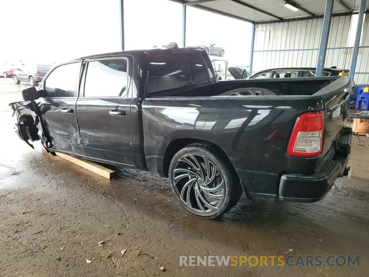 2 Photograph of a damaged car 1C6SRFFT3KN780768 RAM 1500 2019
