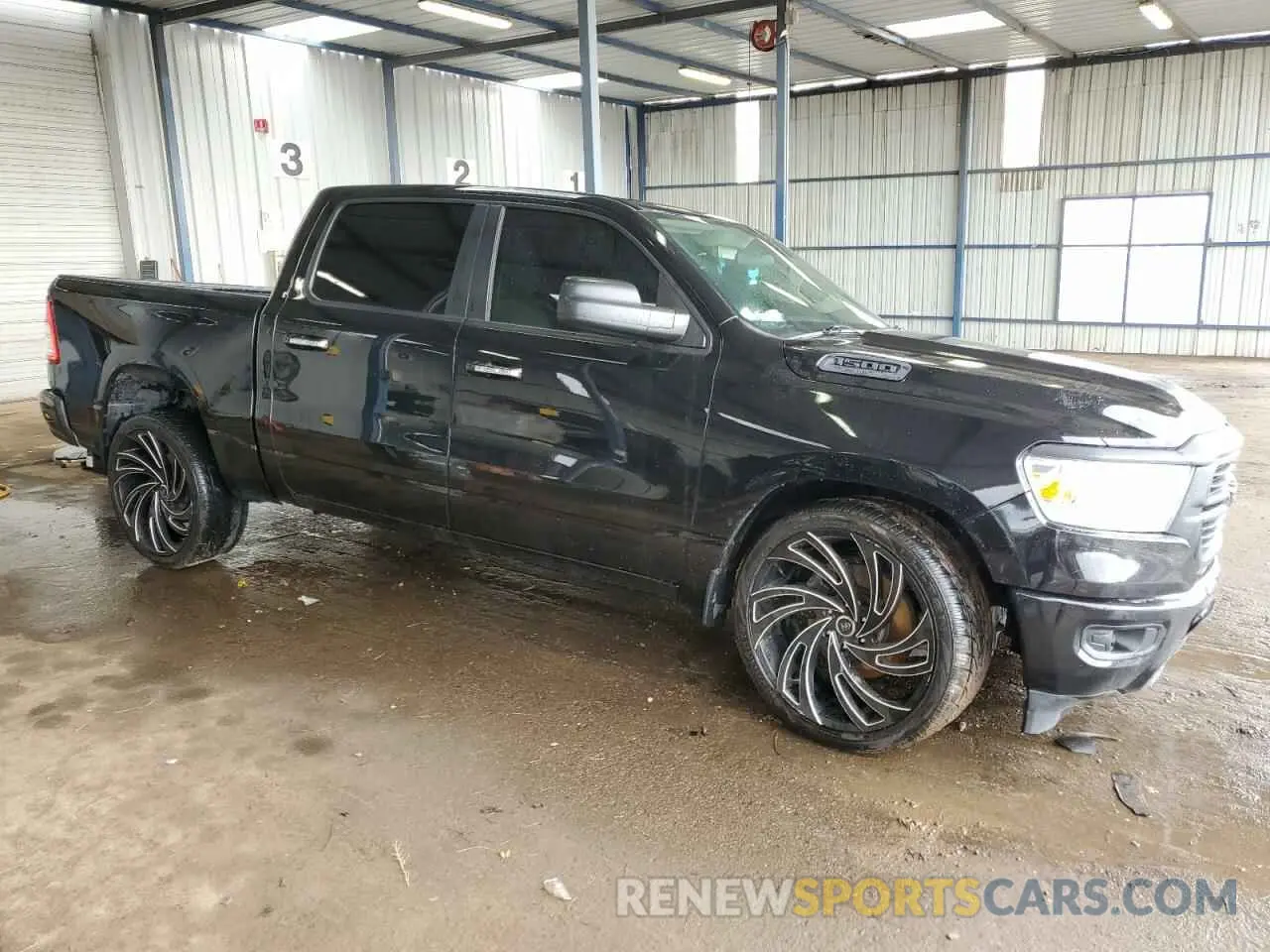 4 Photograph of a damaged car 1C6SRFFT3KN780768 RAM 1500 2019