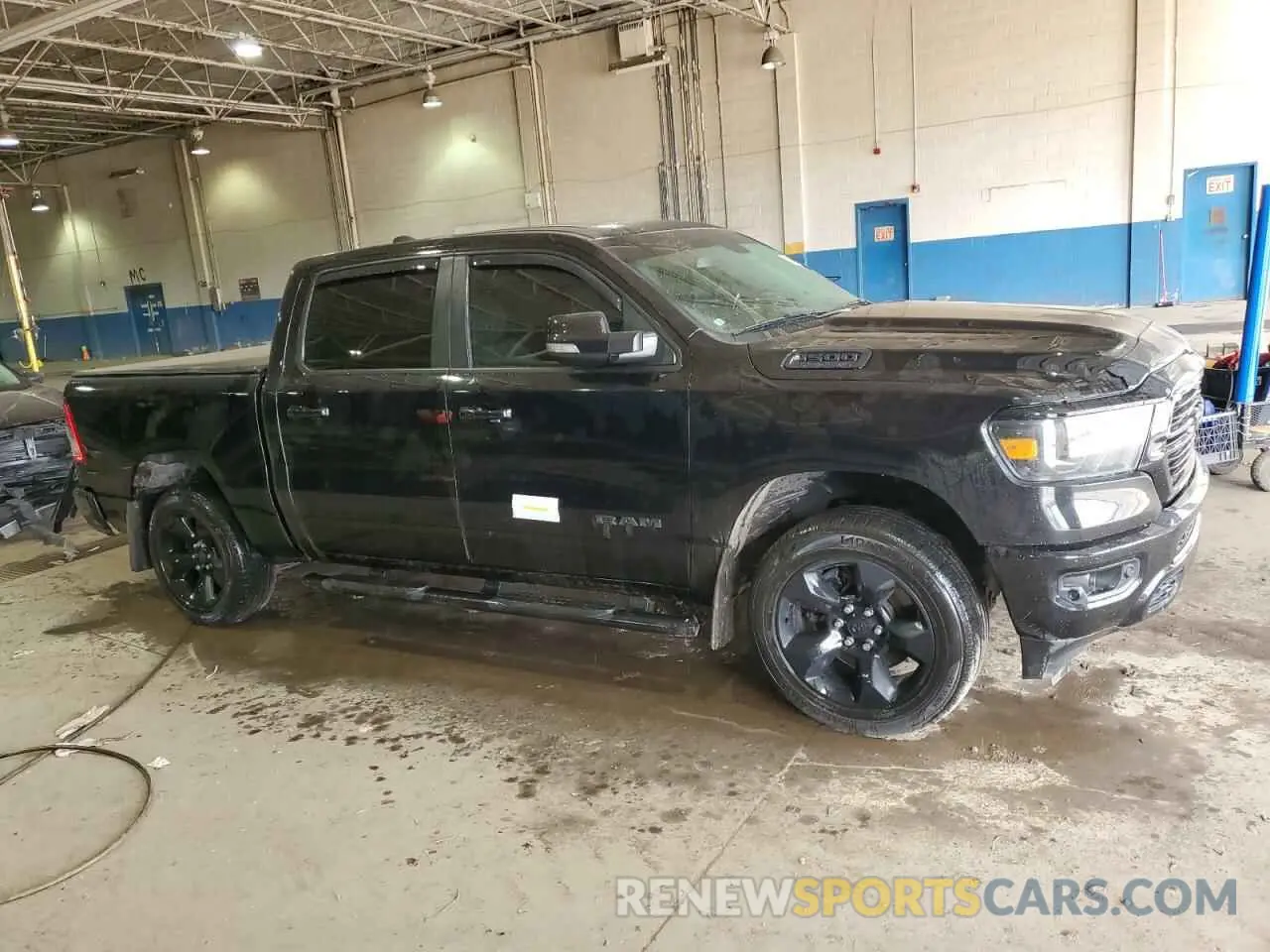 4 Photograph of a damaged car 1C6SRFFT3KN783850 RAM 1500 2019
