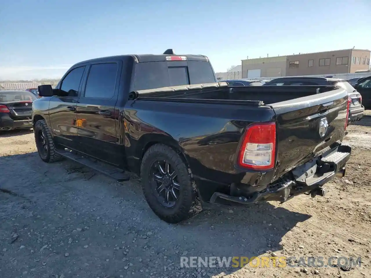 2 Photograph of a damaged car 1C6SRFFT3KN788658 RAM 1500 2019