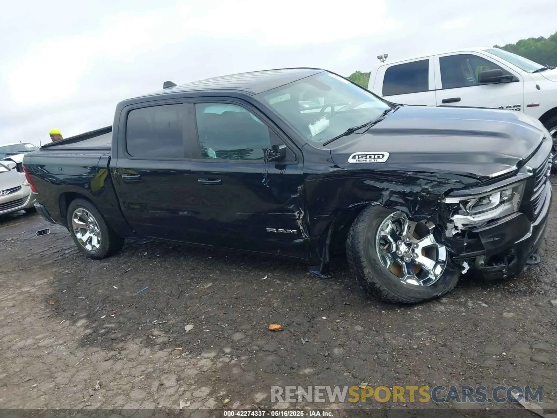 13 Photograph of a damaged car 1C6SRFFT3KN858854 RAM 1500 2019