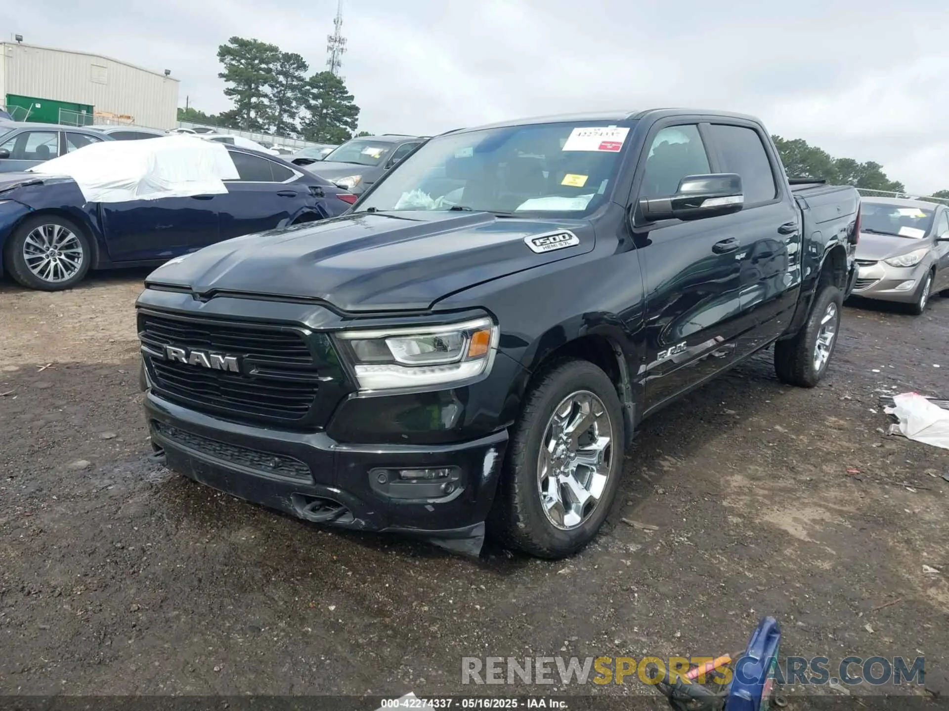 2 Photograph of a damaged car 1C6SRFFT3KN858854 RAM 1500 2019