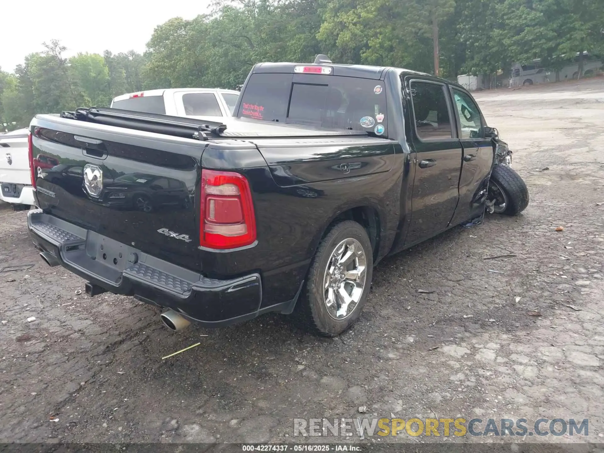 4 Photograph of a damaged car 1C6SRFFT3KN858854 RAM 1500 2019