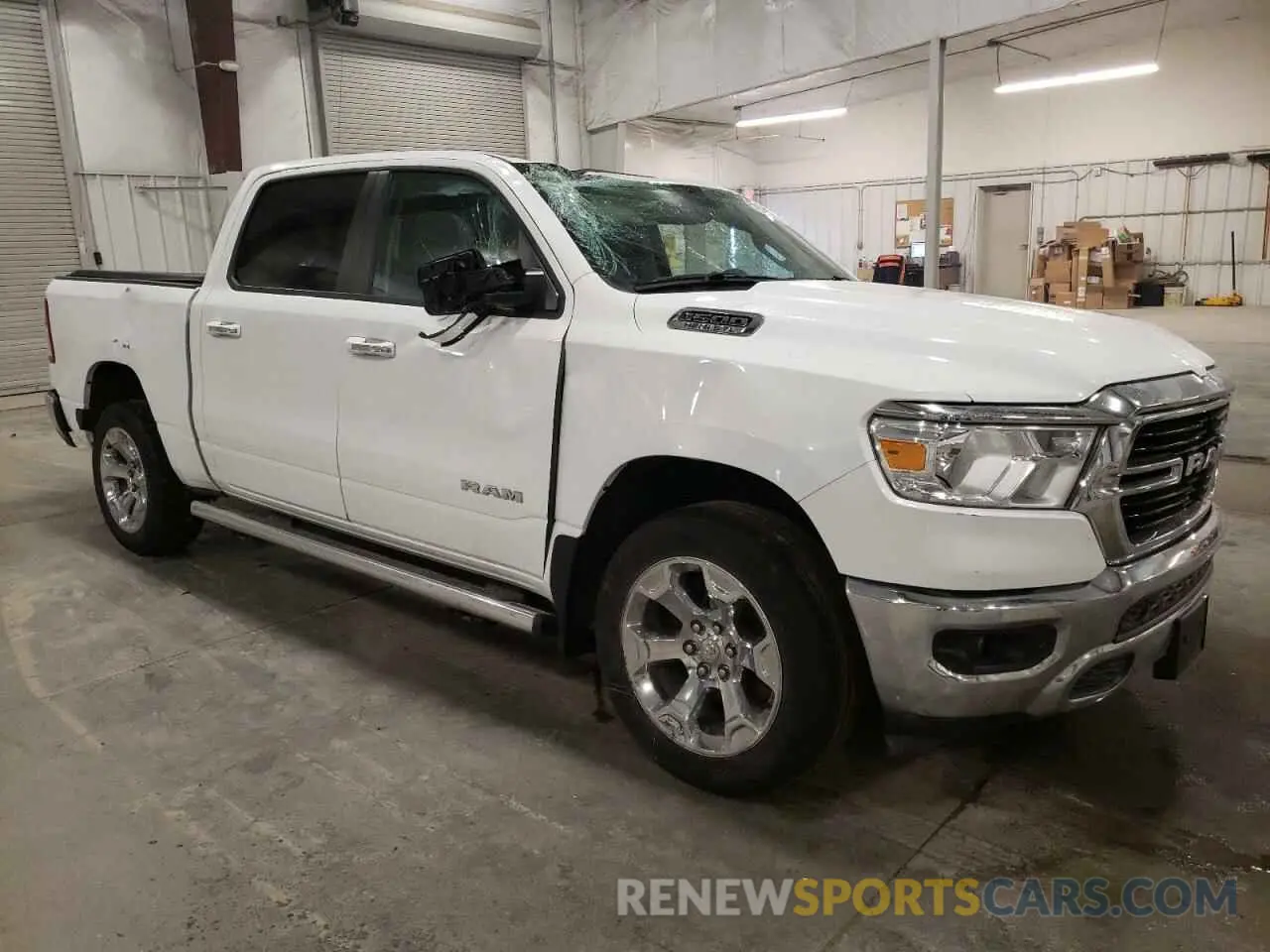 4 Photograph of a damaged car 1C6SRFFT3KN882572 RAM 1500 2019