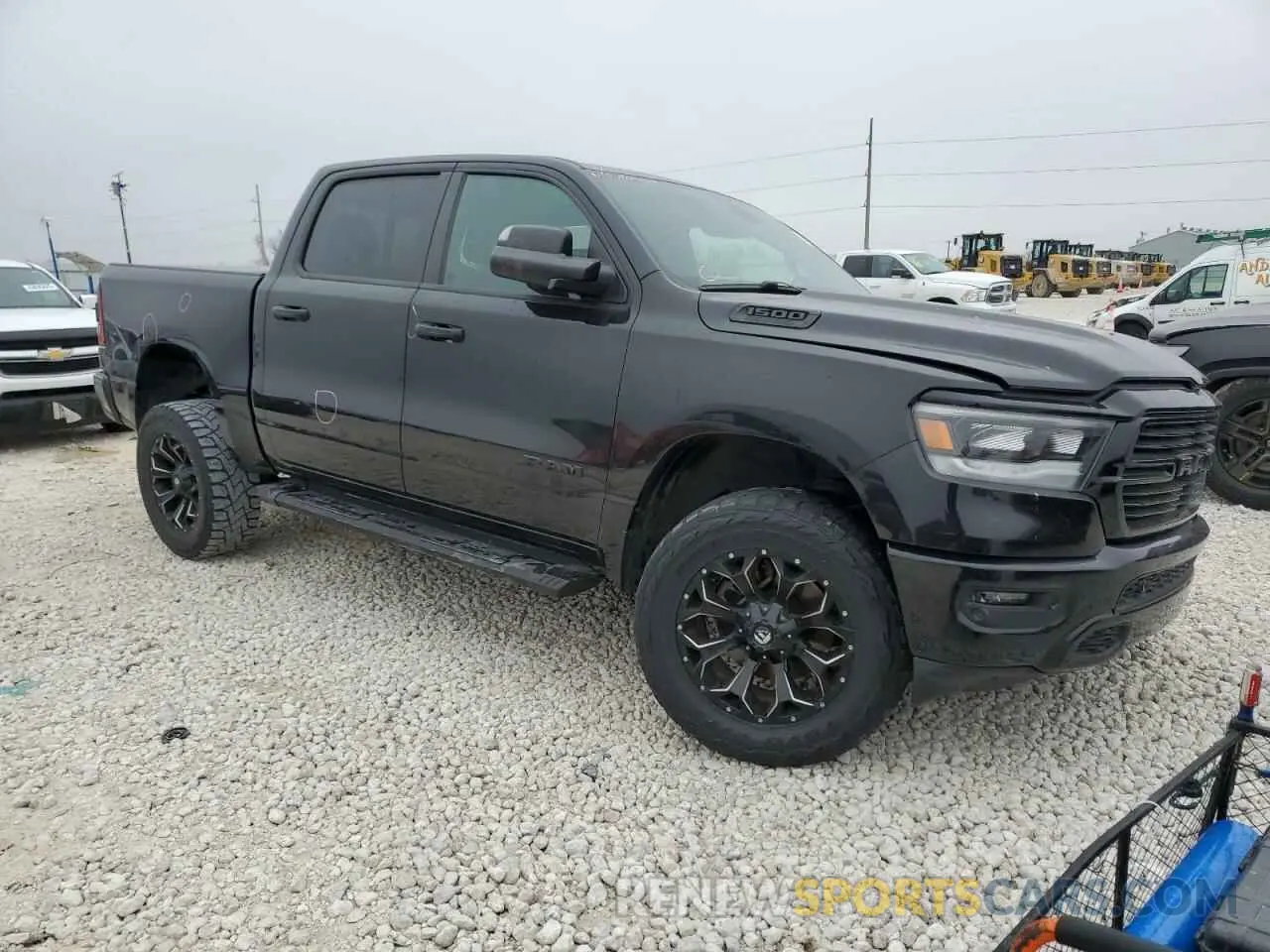 4 Photograph of a damaged car 1C6SRFFT3KN909351 RAM 1500 2019