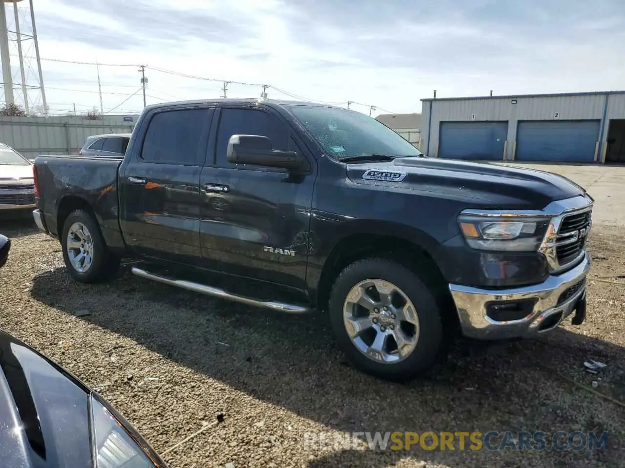 4 Photograph of a damaged car 1C6SRFFT4KN536823 RAM 1500 2019